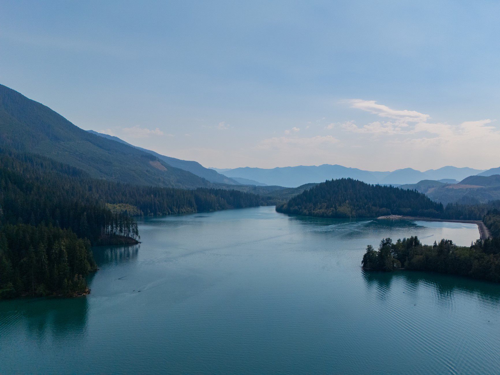 Lake with mountains in the background