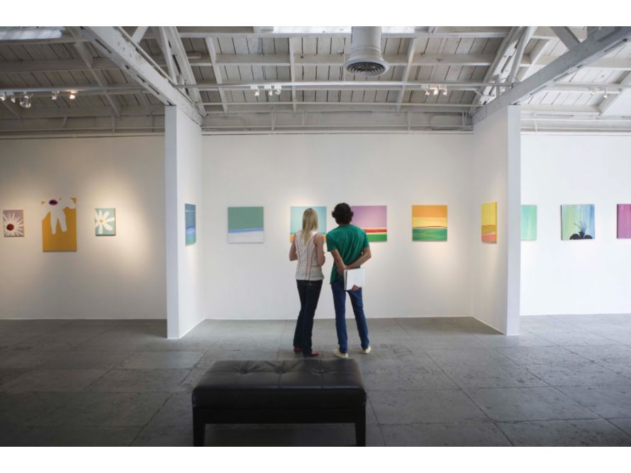 Woman and man viewing art