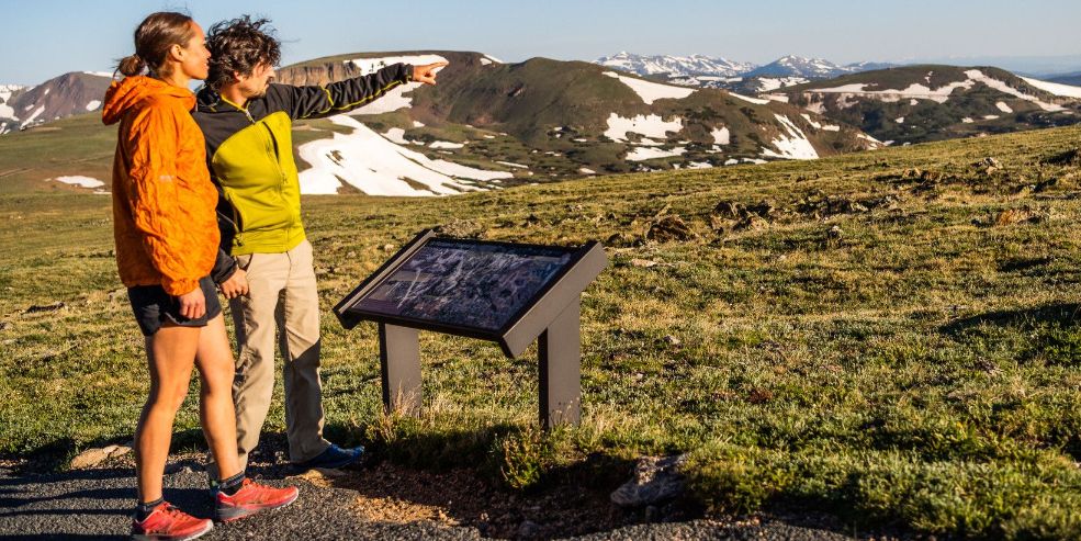 Hikers enjoying view of Estes Park Colorado