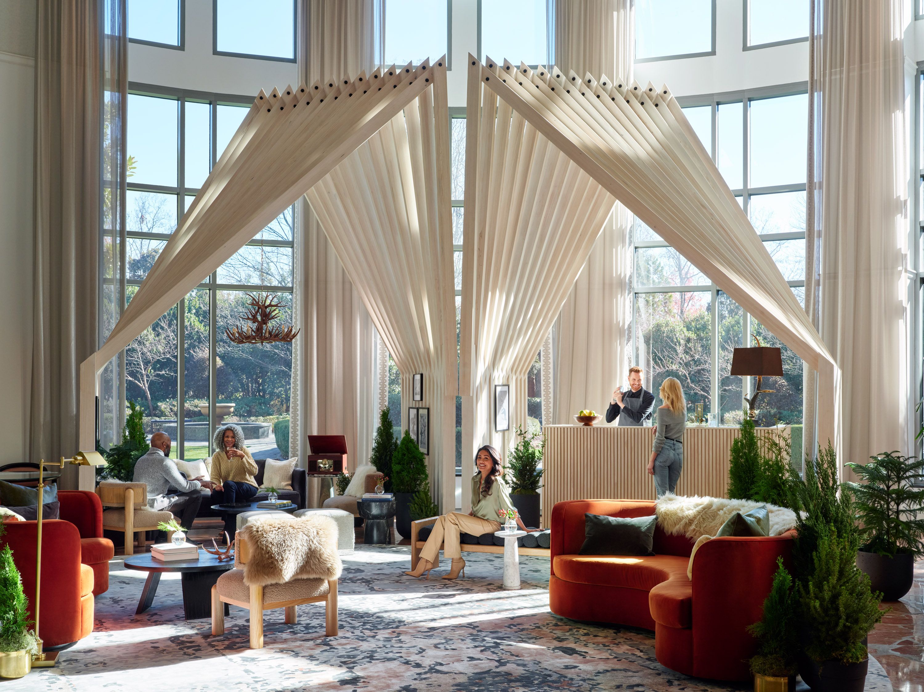Experience InterContinental Buckhead Atlanta's Winter Chalet with a wooden angled artist's installation