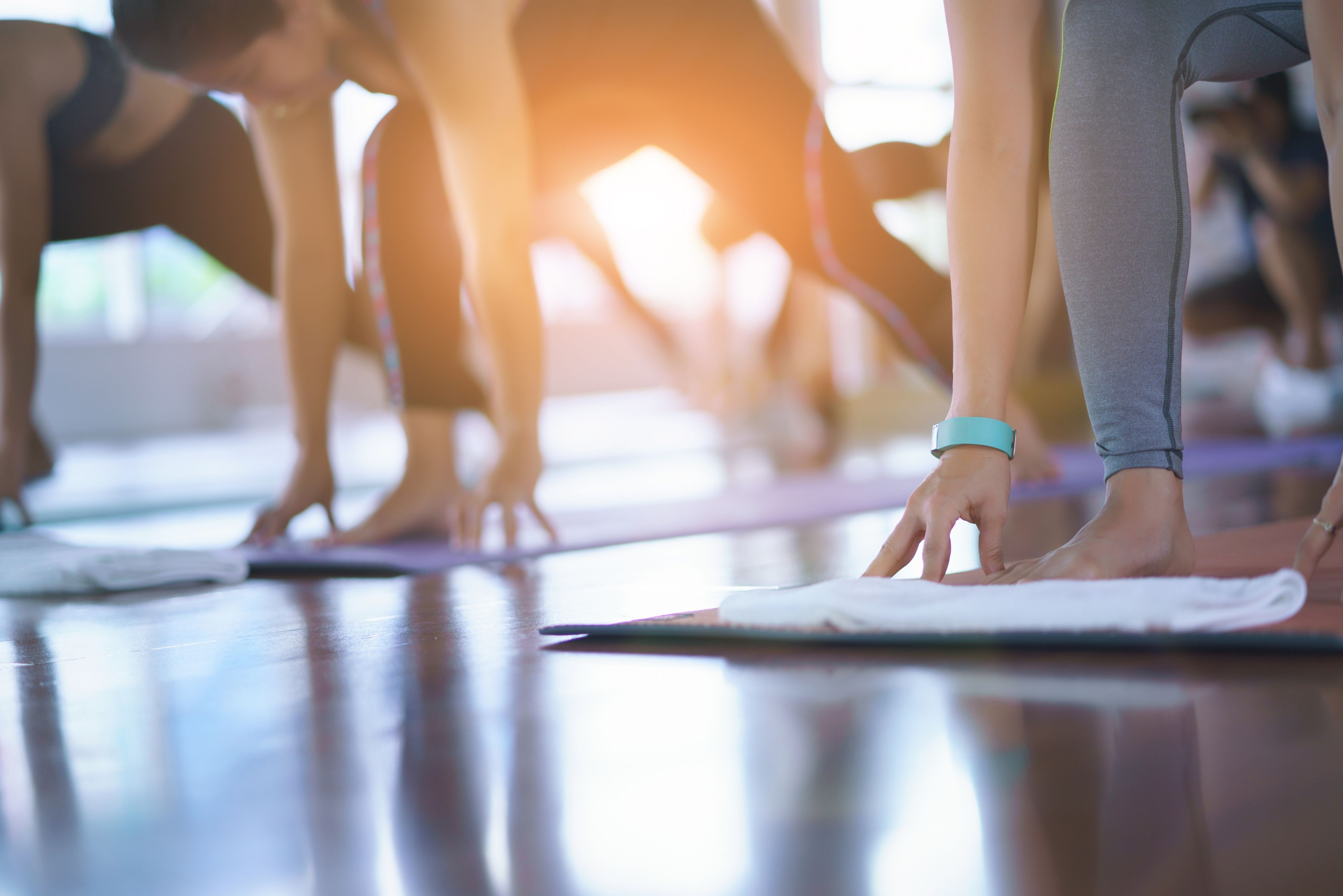 Woman sitting legs crossed in yoga position