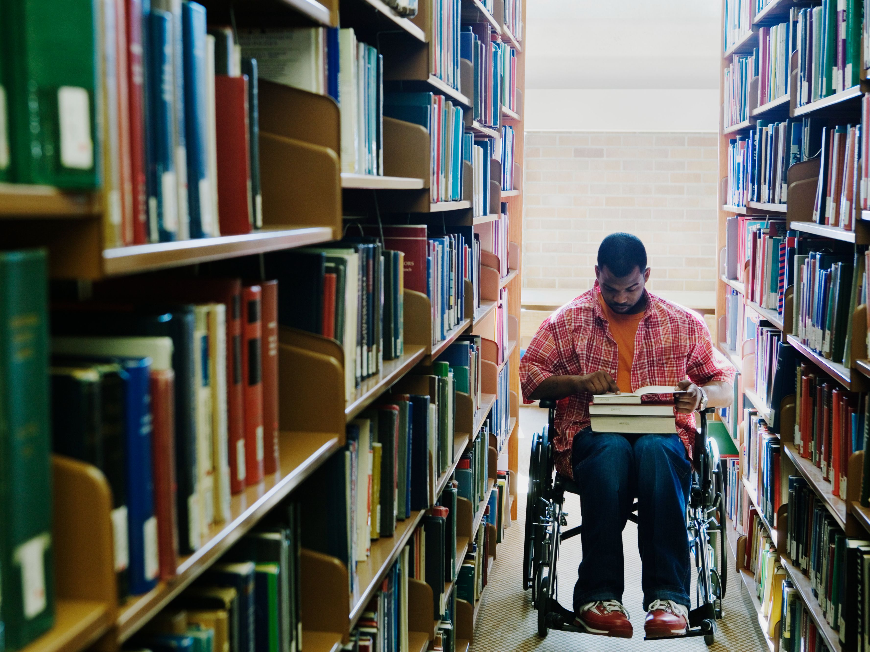 student in library