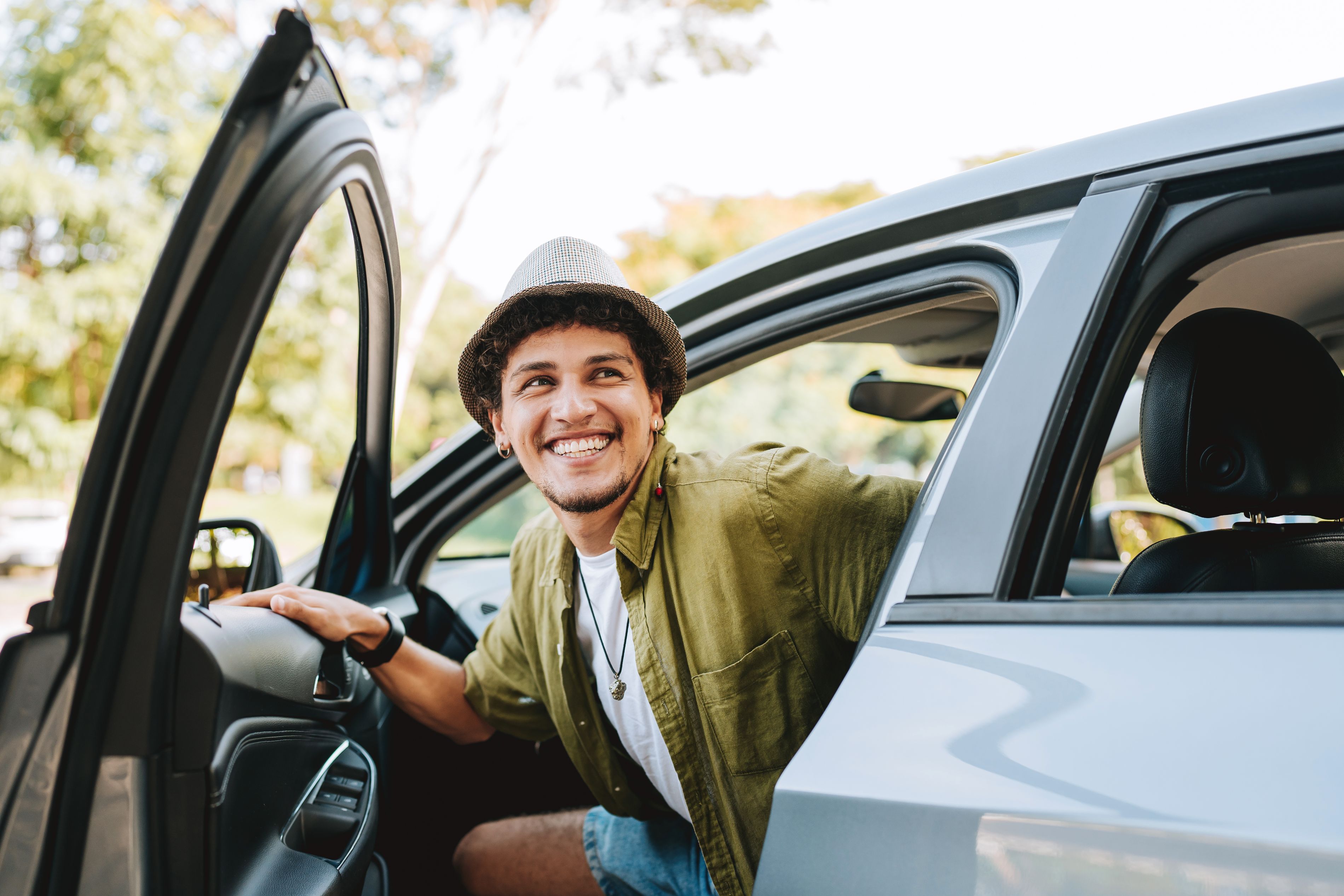 man opening a car door