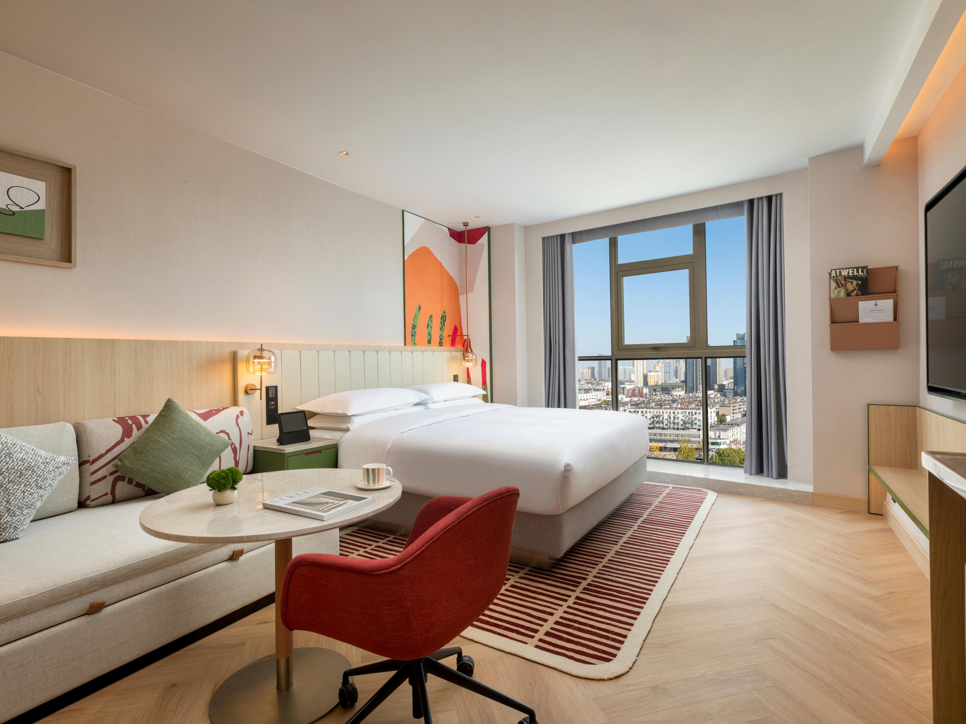 Our rooms and suites are thoughtfully designed with smart home appliances and plenty of room to work, rest, and recharge. The wet bar counter in room creating a cozy nook for relaxation, while the sofa bed provided in some of the rooms and suites can be easily adjusted for hosting friends or creating family fun activity space.