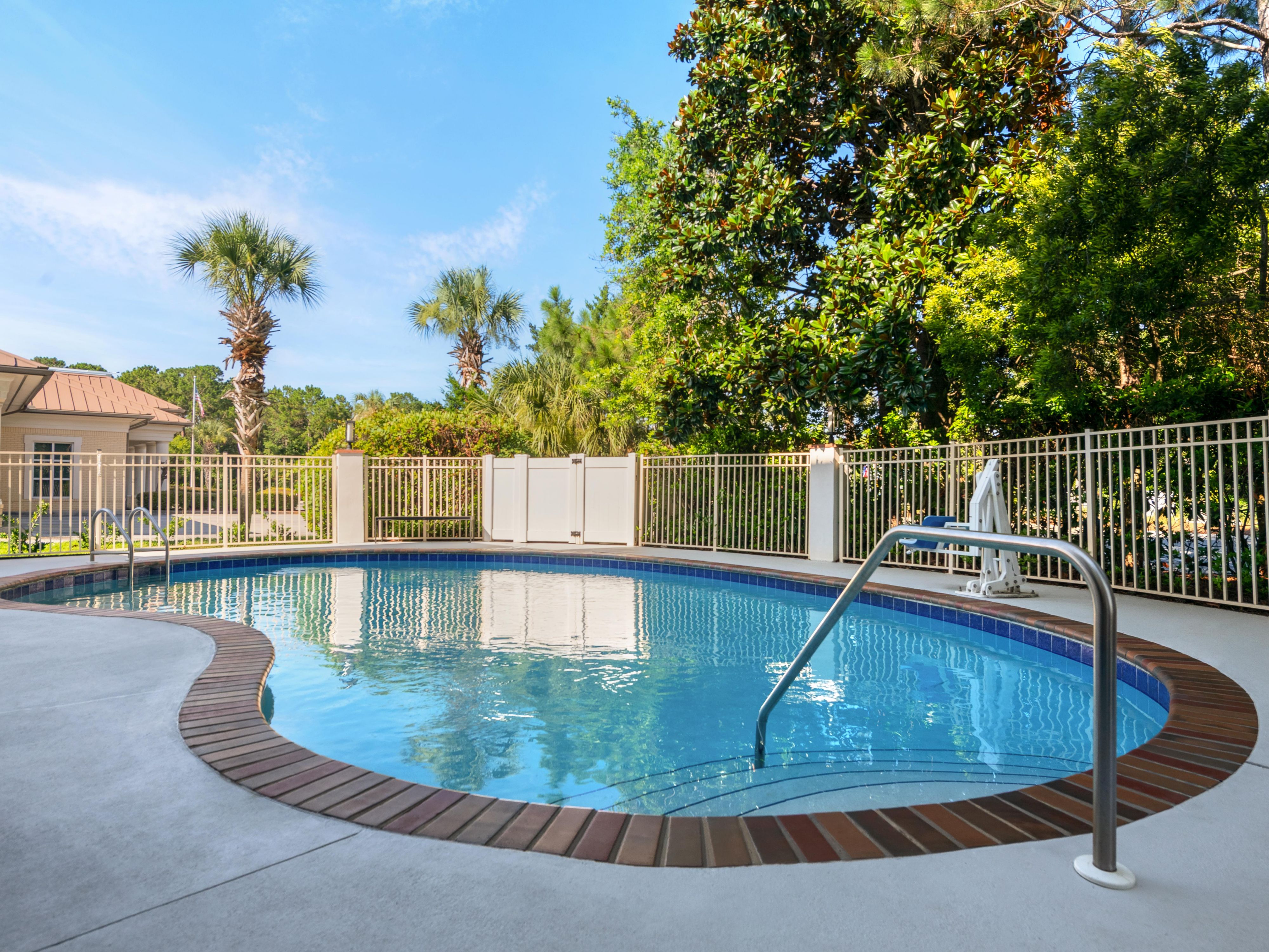 Outdoor pool at Atwell Suites Panama City Beach hotel.