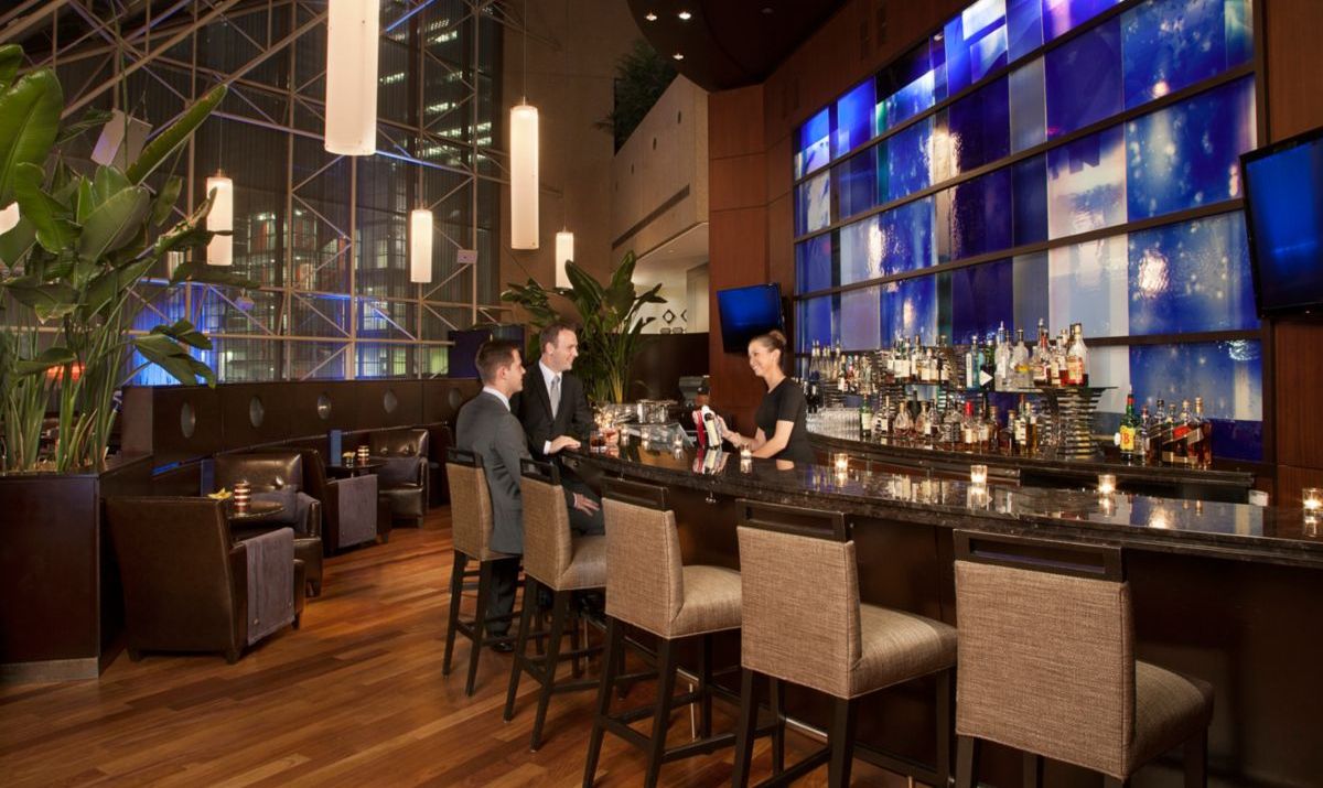 Enjoy cocktails at the bar and lounge in our Toronto hotel