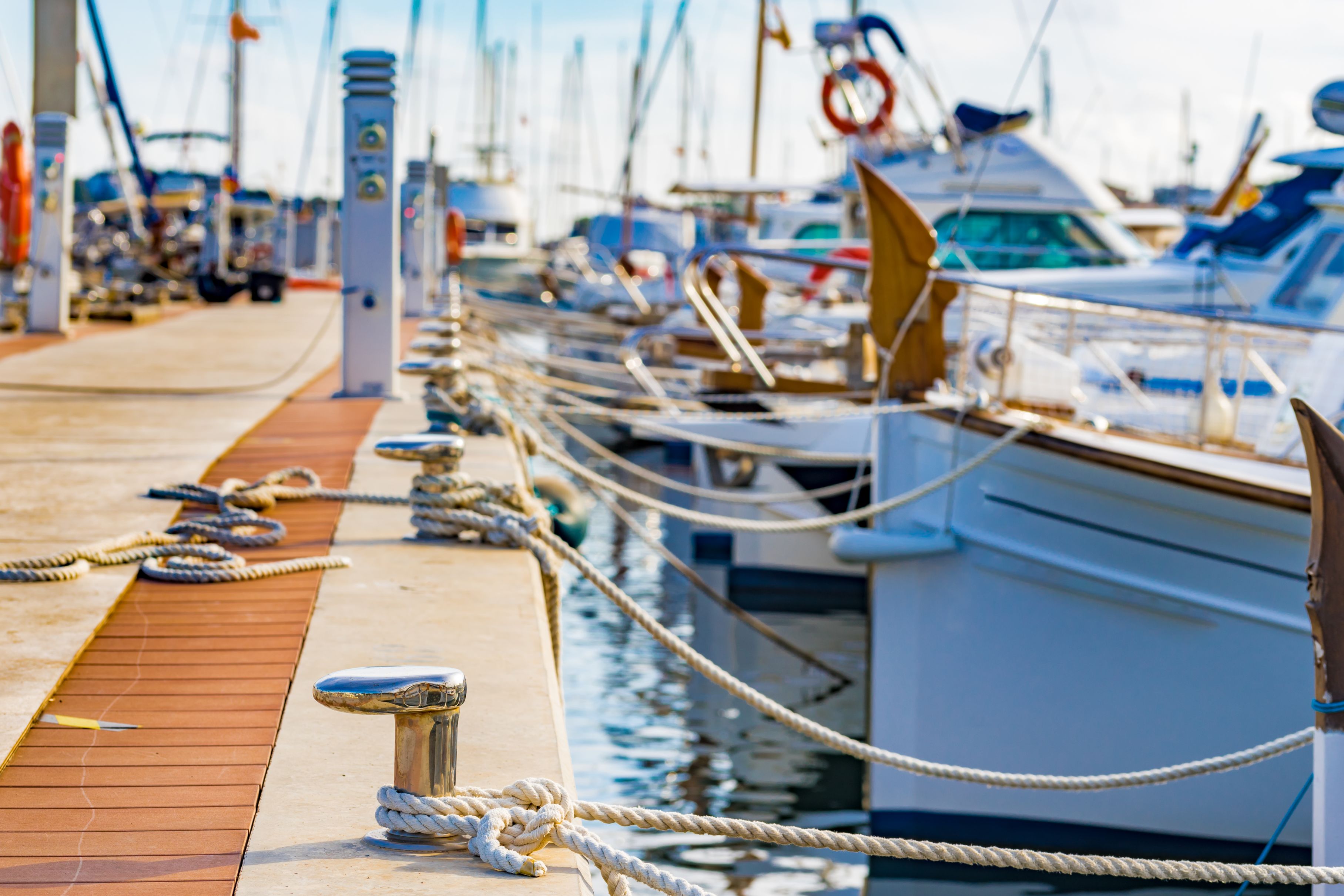 Boats tied to a dock.