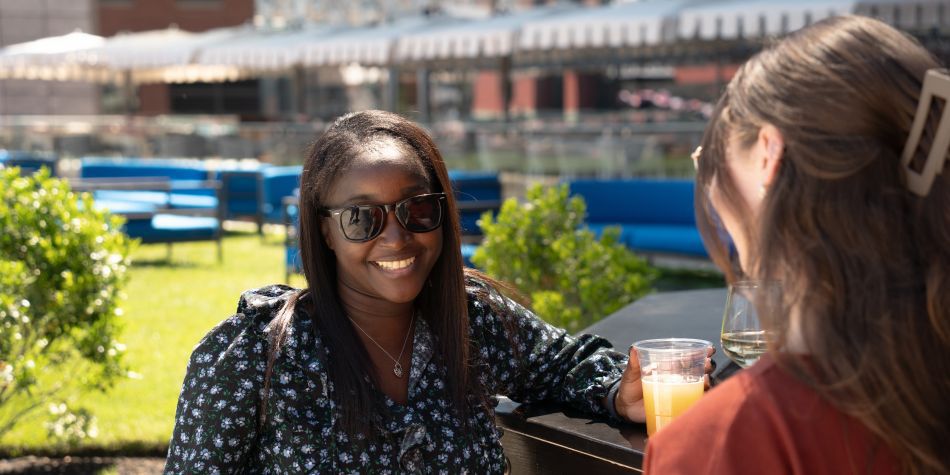 Guests talking and enjoying a drink at 510 Waterfront.