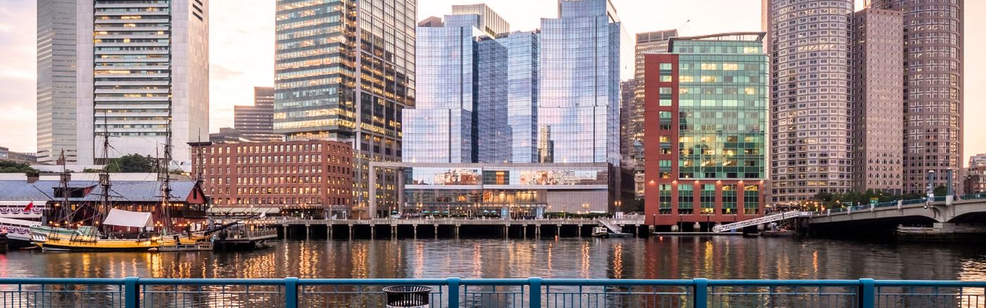 Boston waterfront showcasing buildings across the water.