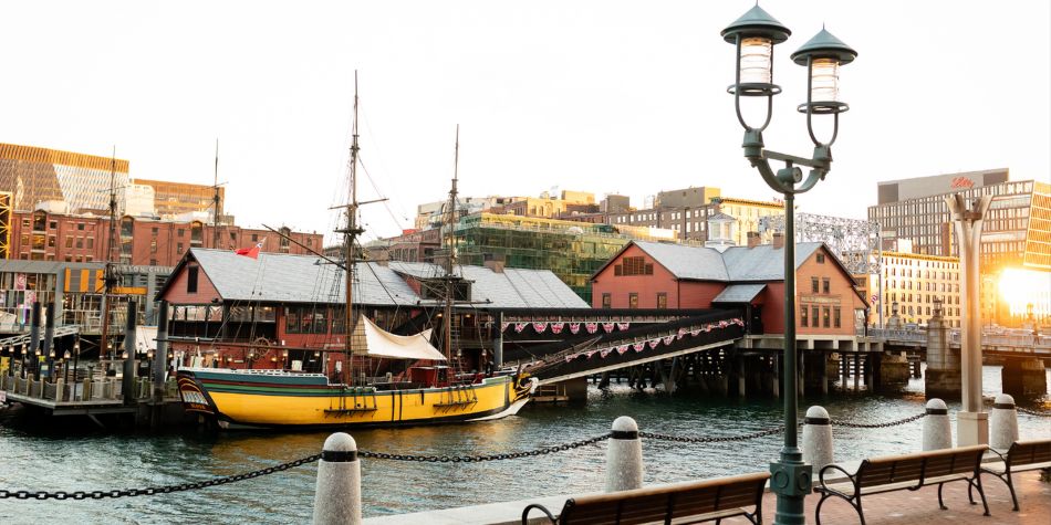 Pier and boat at Boston waterfront.