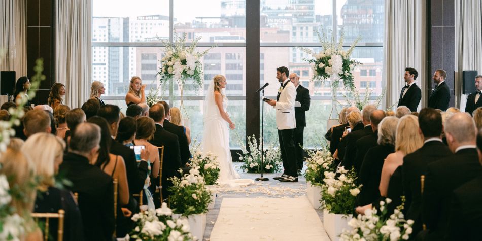 Bride and groom saying their vows at the alter.