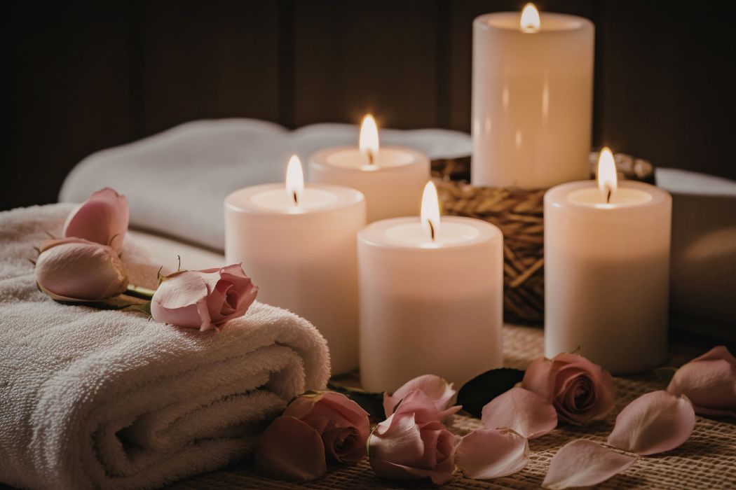 Candles and rose petals set up at the spa.