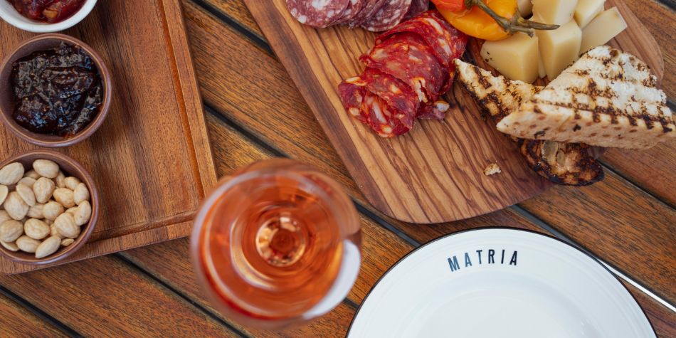 Charcuterie board and cocktail from Matria.