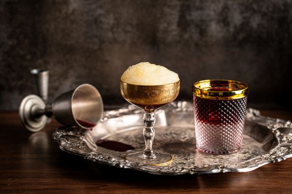 Cocktails on a vintage silver serving platter.