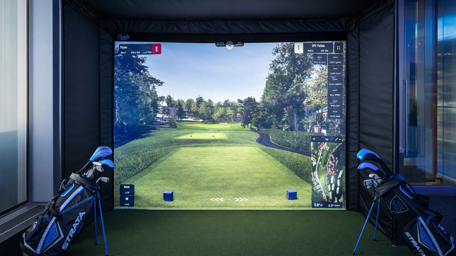 man playing golf on golf simulator