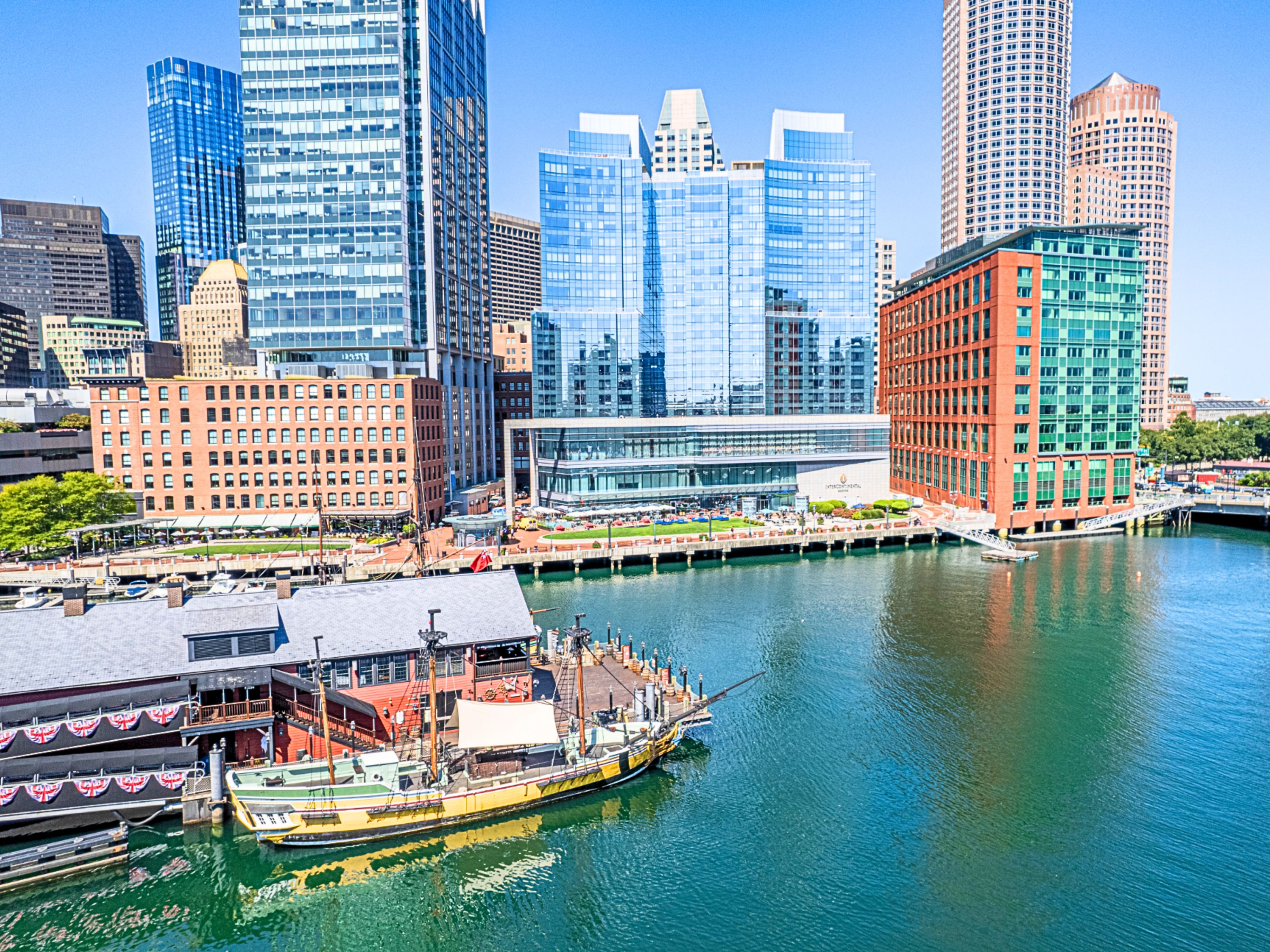 Boston Seaport waterfront with tall ship and view of IC Boston.