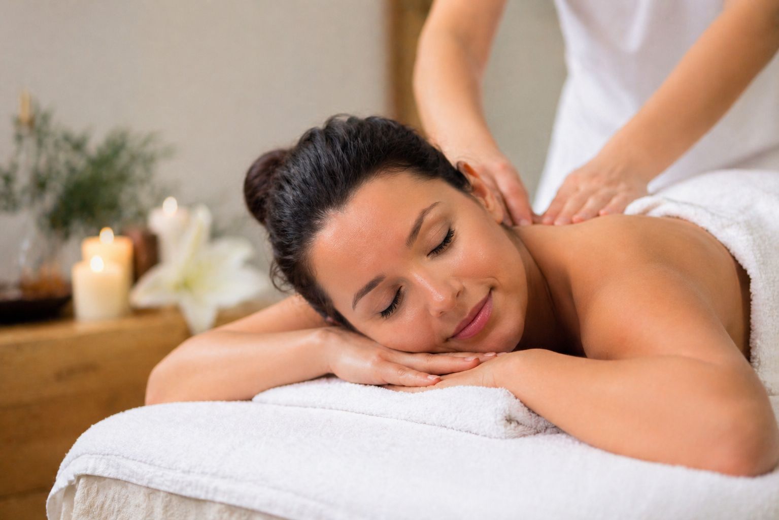 Mom receiving a massage at Spa InterContinental.