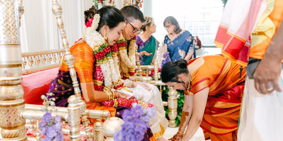 Bride and groom at Southeast Asian wedding ceremony. 