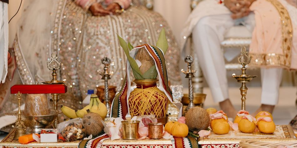 Ceremony table set with traditional adornments for multicultural wedding.