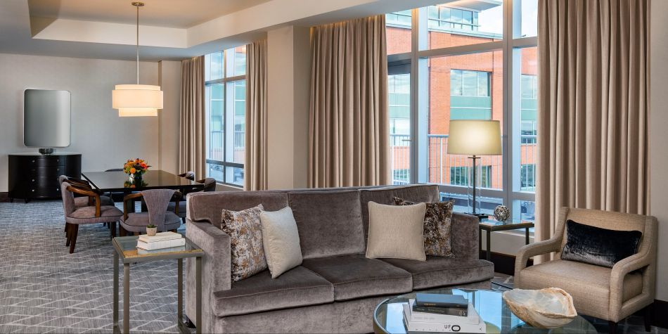 Penthouse suite living and dining room with city view