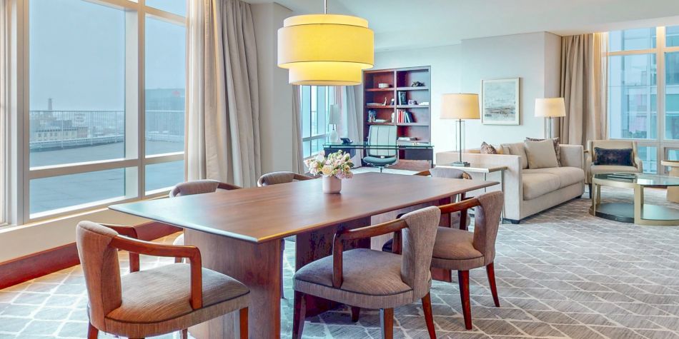 Dining area in Penthouse South Suite with water view