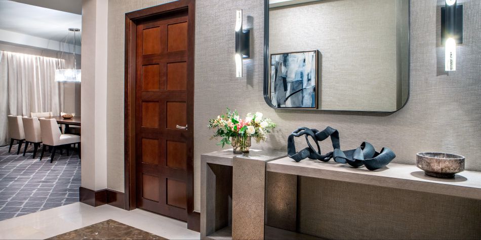 Presidential Suite entryway with modern console table.