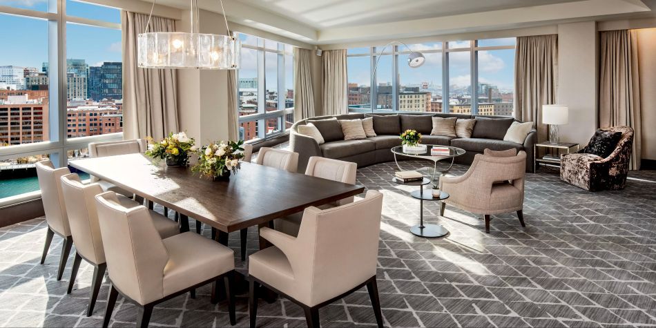 Presidential Suite living and dining room with Boston Harbor view.