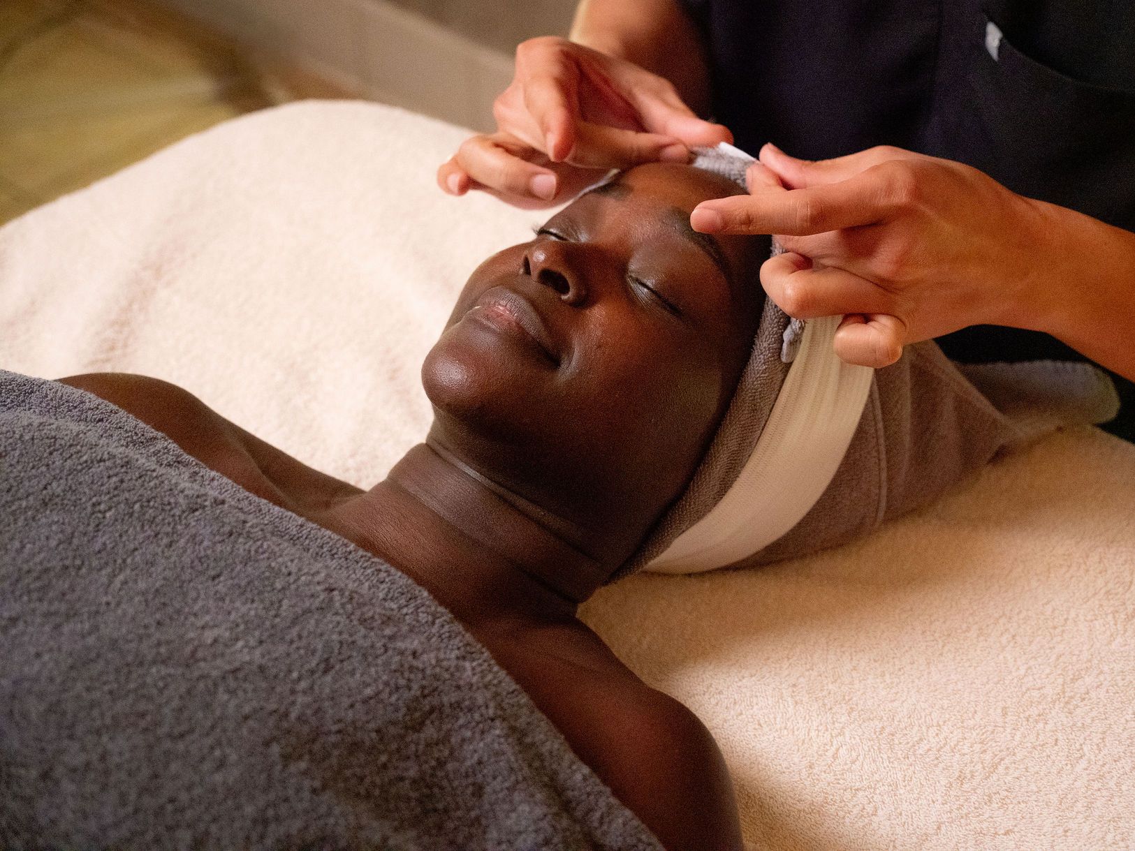 Women getting a facial at the spa