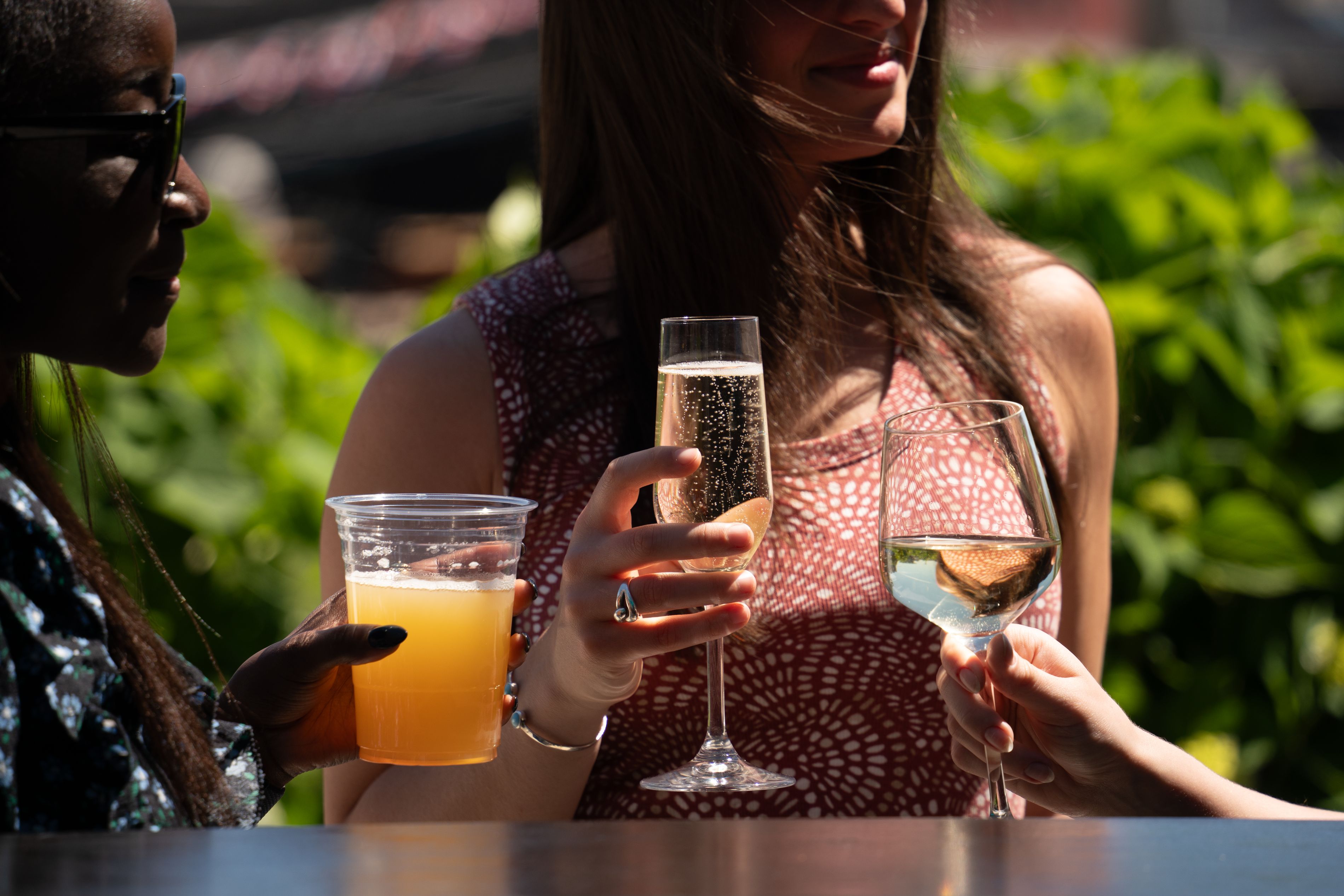 Guests with summer cocktails.