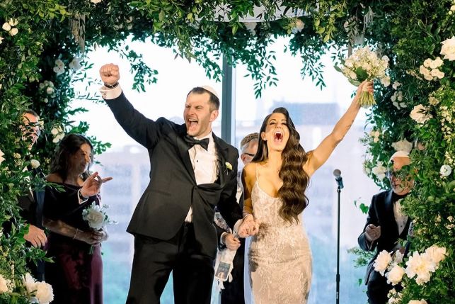 couple celebrating at the alter