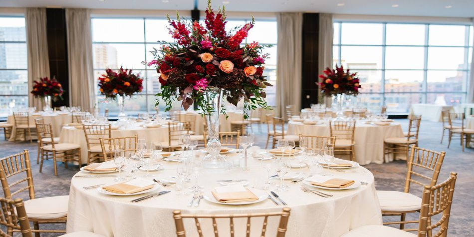 IC Boston wedding space with burgundy flowers