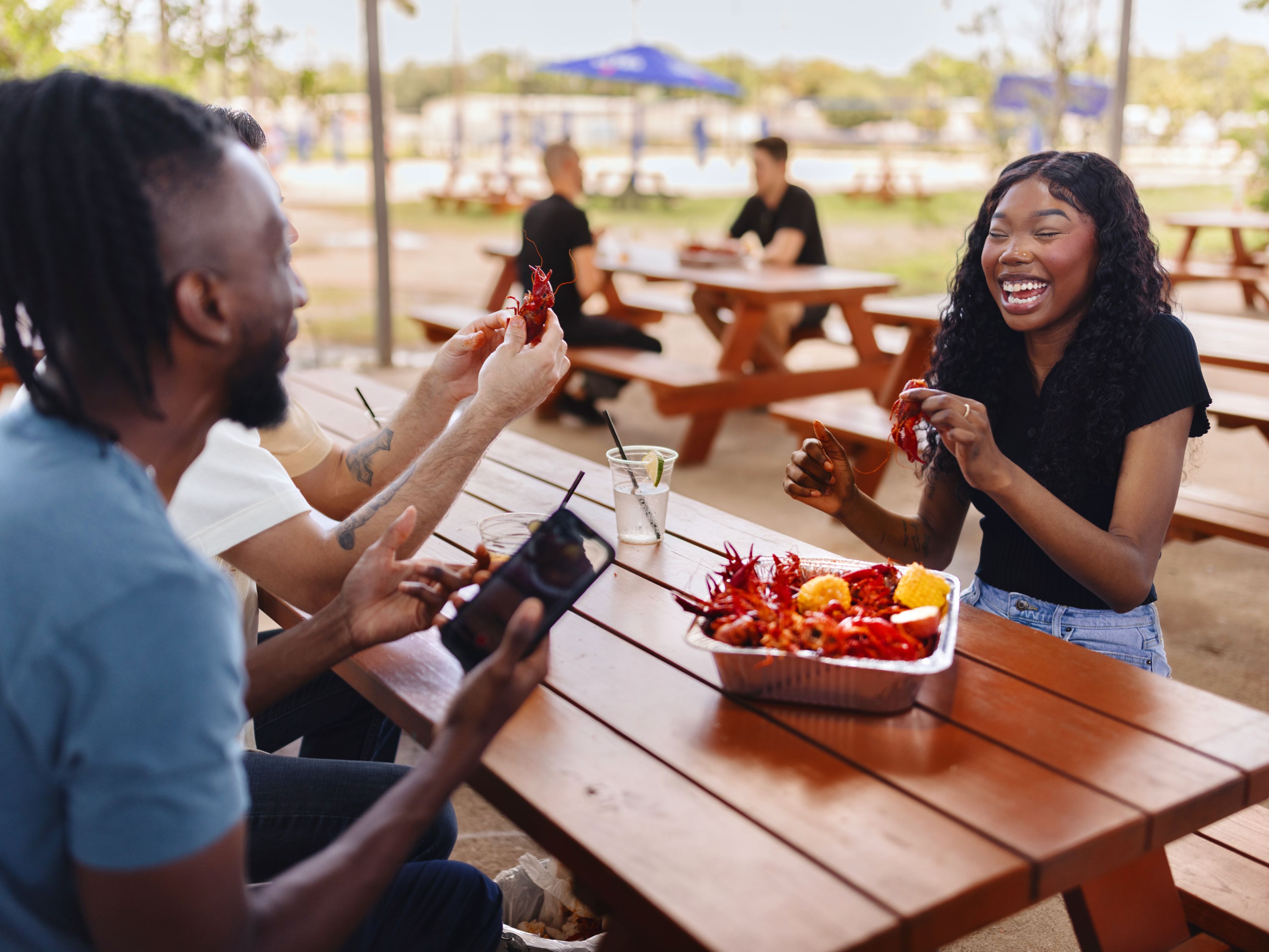 friends enjoying crawfish boil