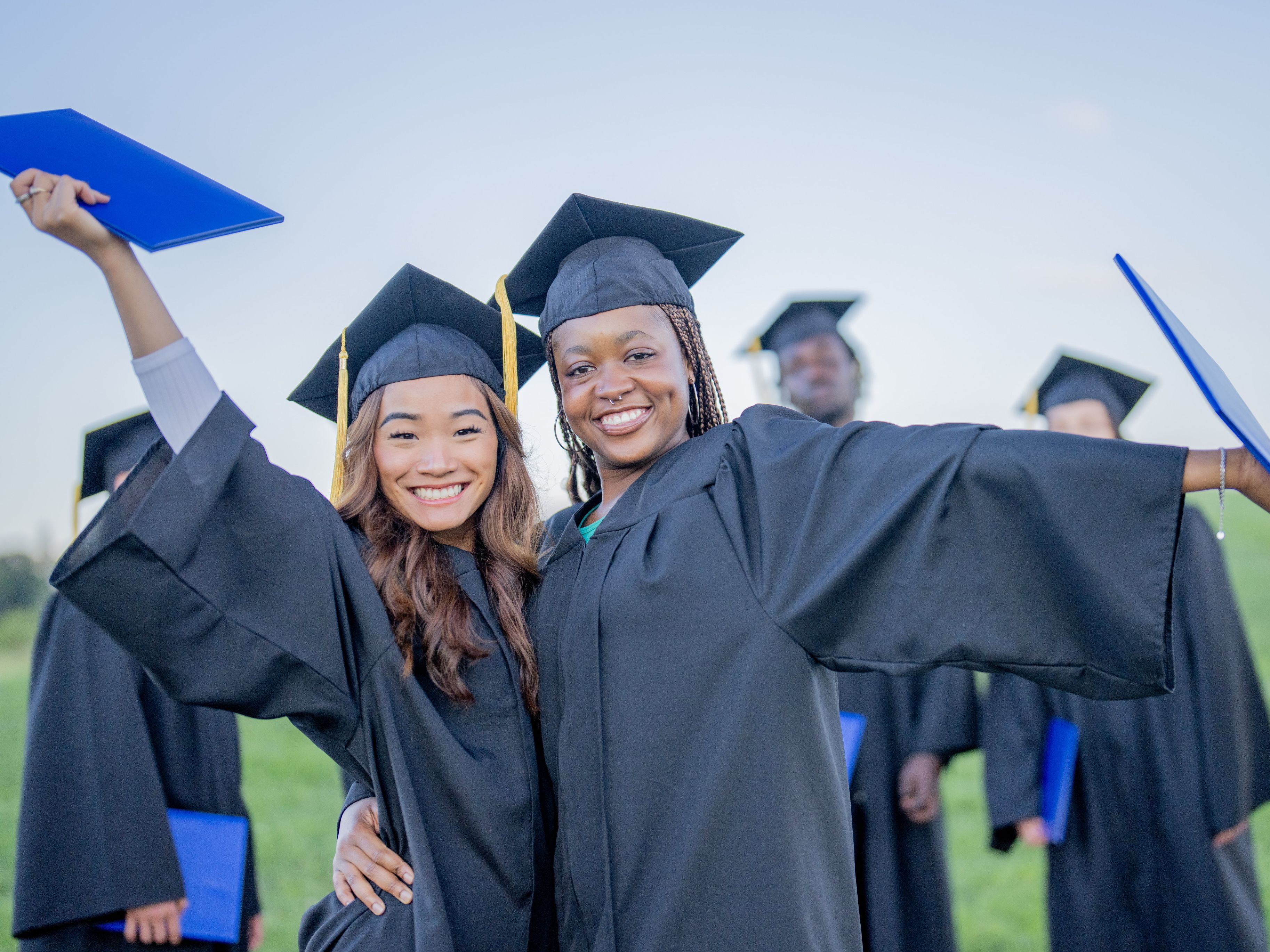 students in caps and gowns