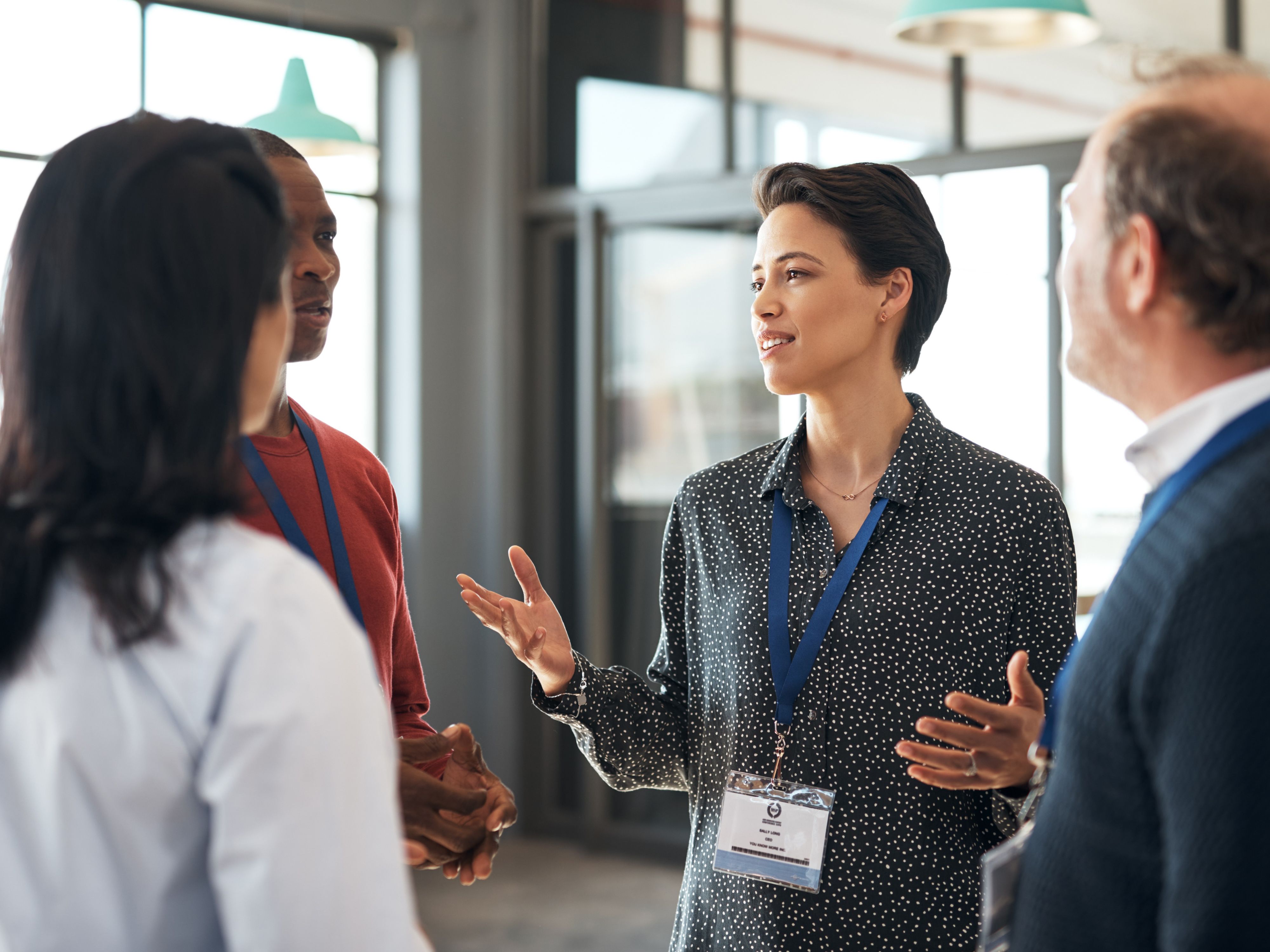 Colleagues talking at a conference