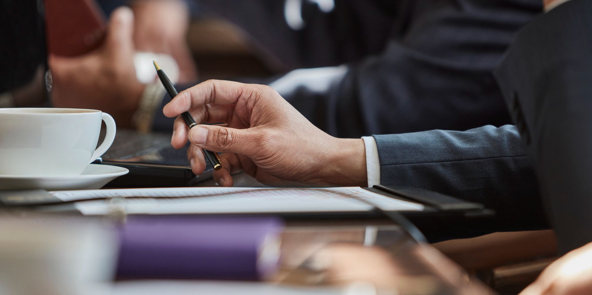 Taking notes at a meeting
