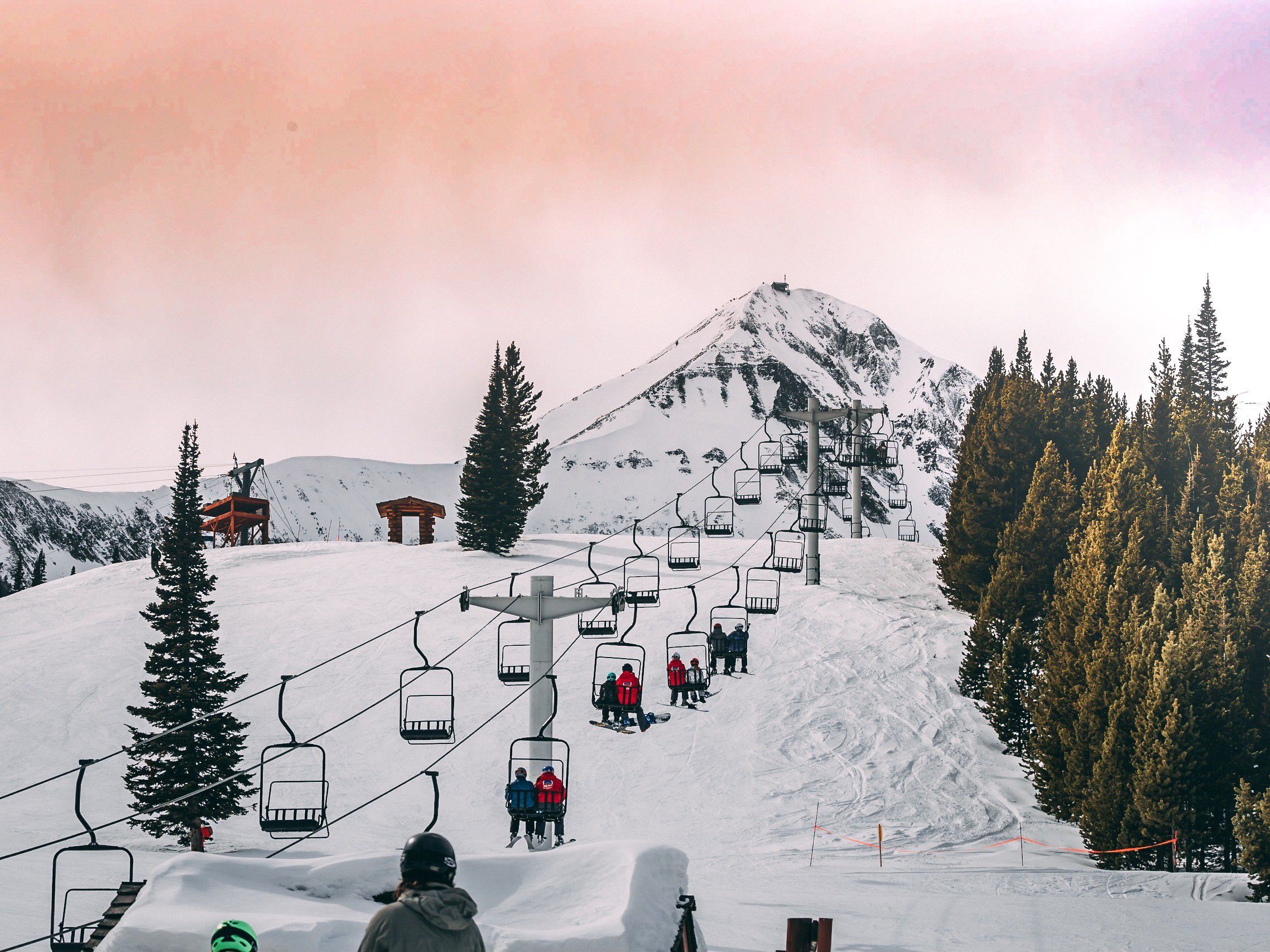 Skiers using the ski lift at Big Sky