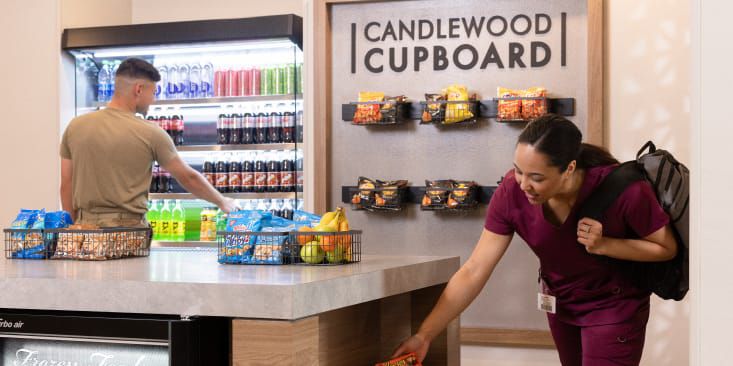 Hotel guests purchasing snacks