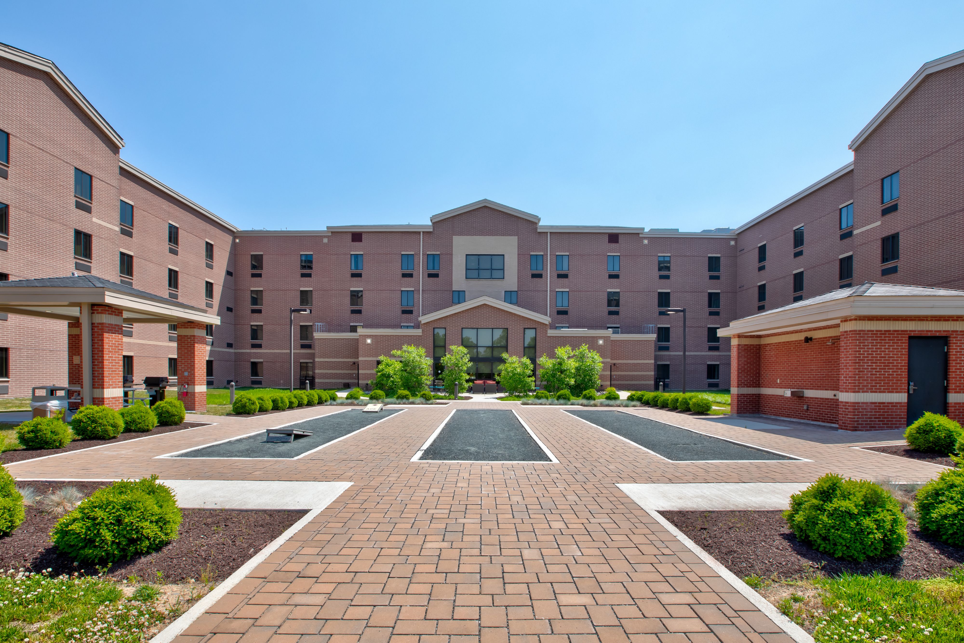 Enjoy outdoor time and play a game of cornhole in our courtyard