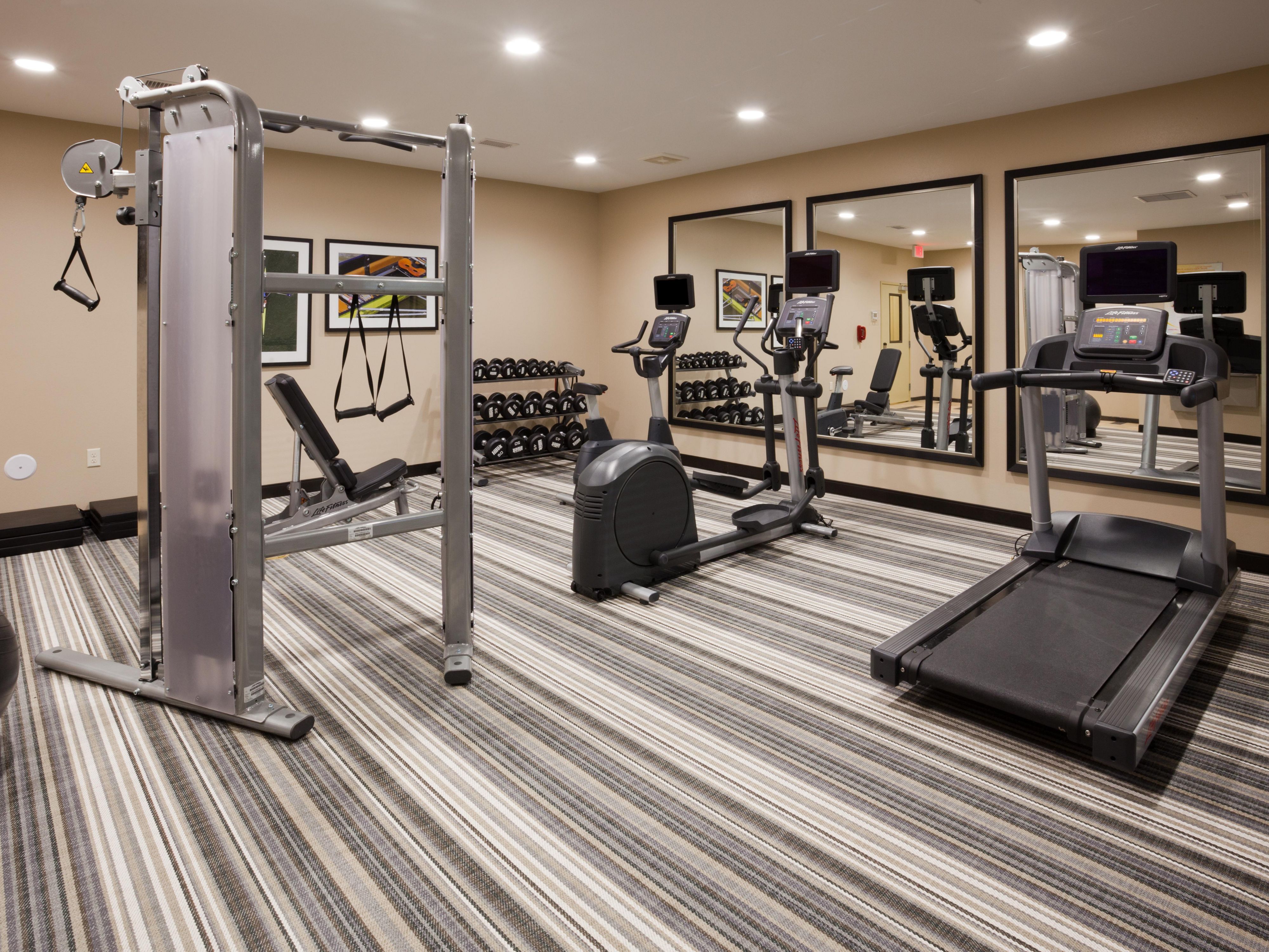 Stay fit, healthy, and happy in our Candlewood Fitness Center.