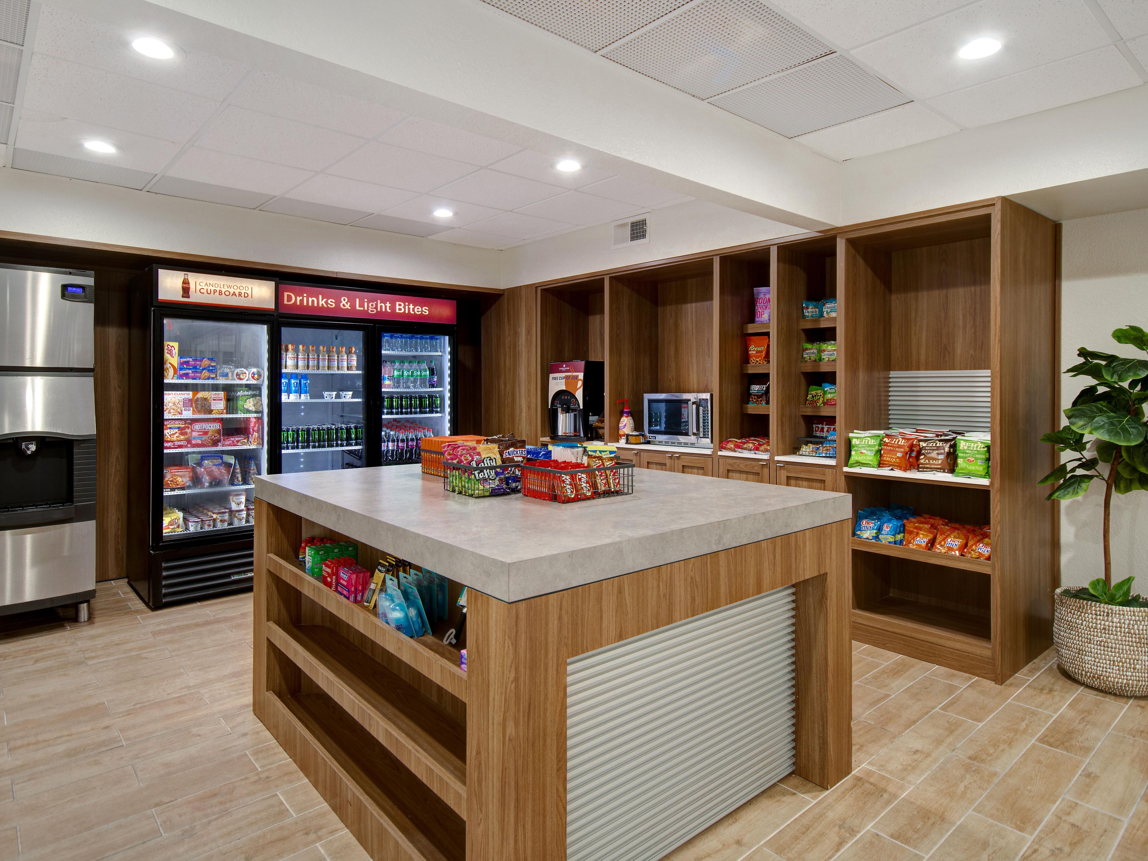 Experience unmatched convenience with our Candlewood Cupboard. This 24/7 mini-market is your go-to spot for snacks, beverages, and everyday essentials, ensuring you have everything you need. Whether it's a quick bite, a midnight snack, or that forgotten toothbrush, the Candlewood Cupboard has you covered, making your stay hassle free.