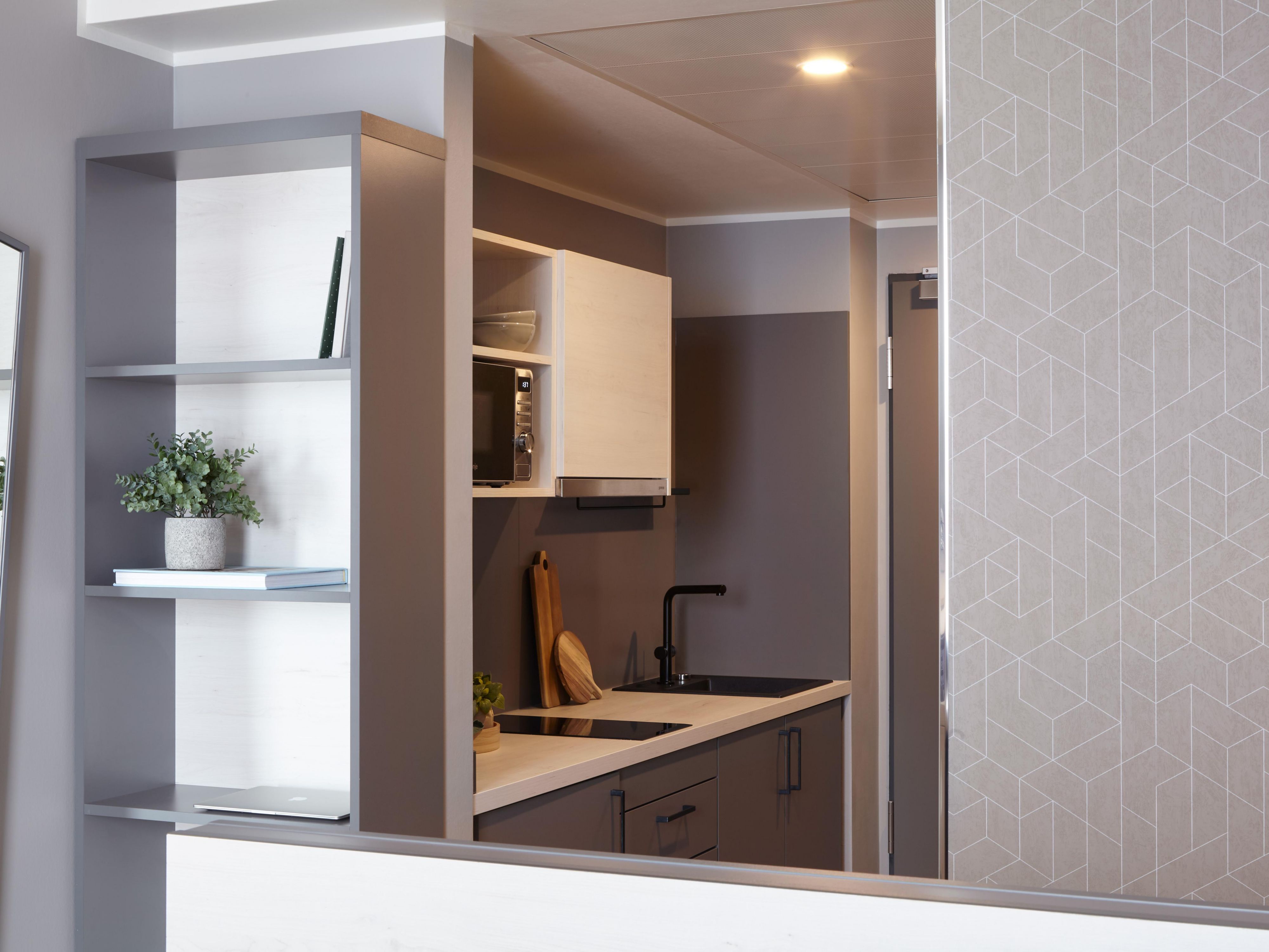 Kitchenette with microwave and supplies
