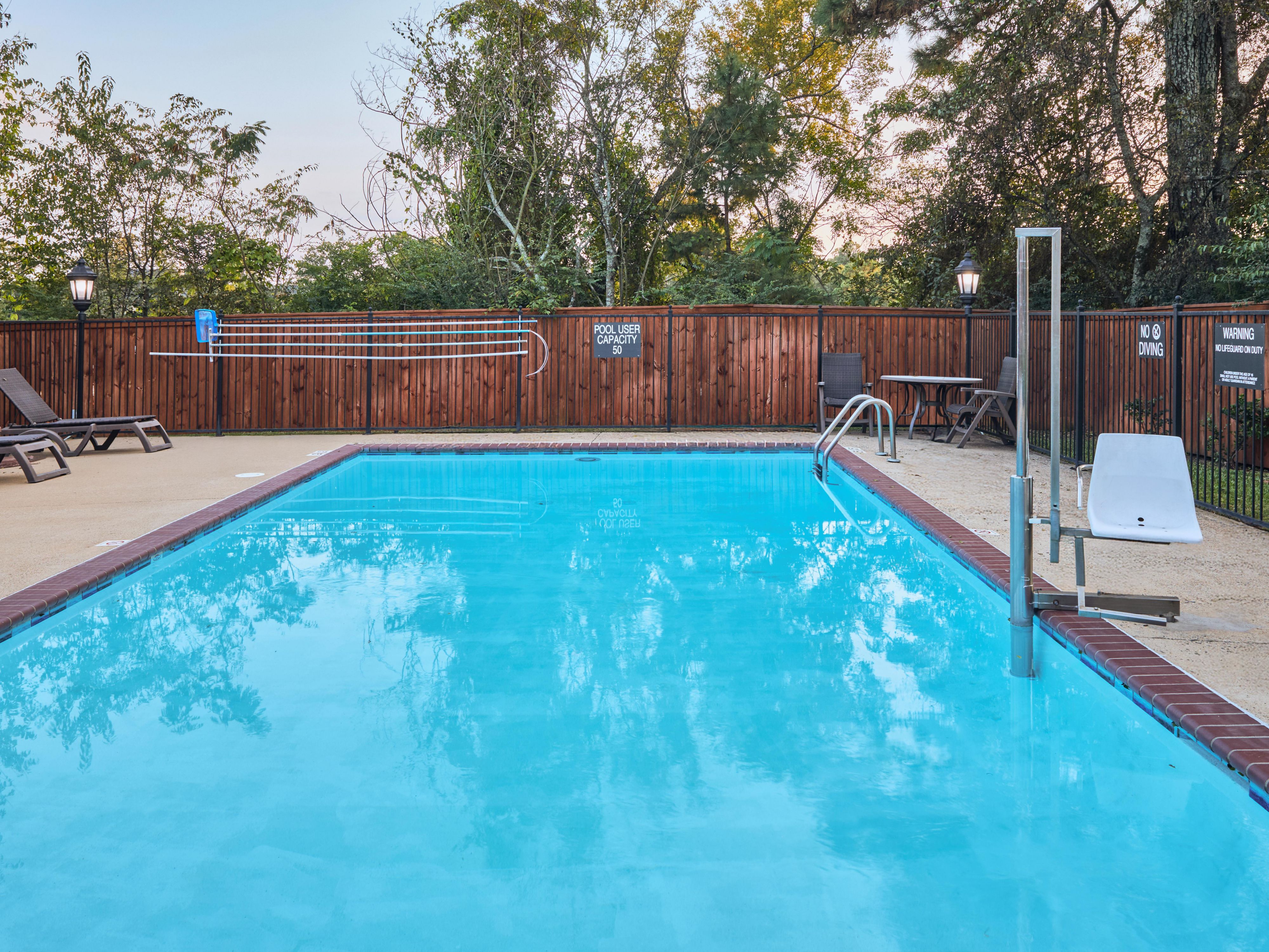 Enjoy poolside relaxation during your stay.