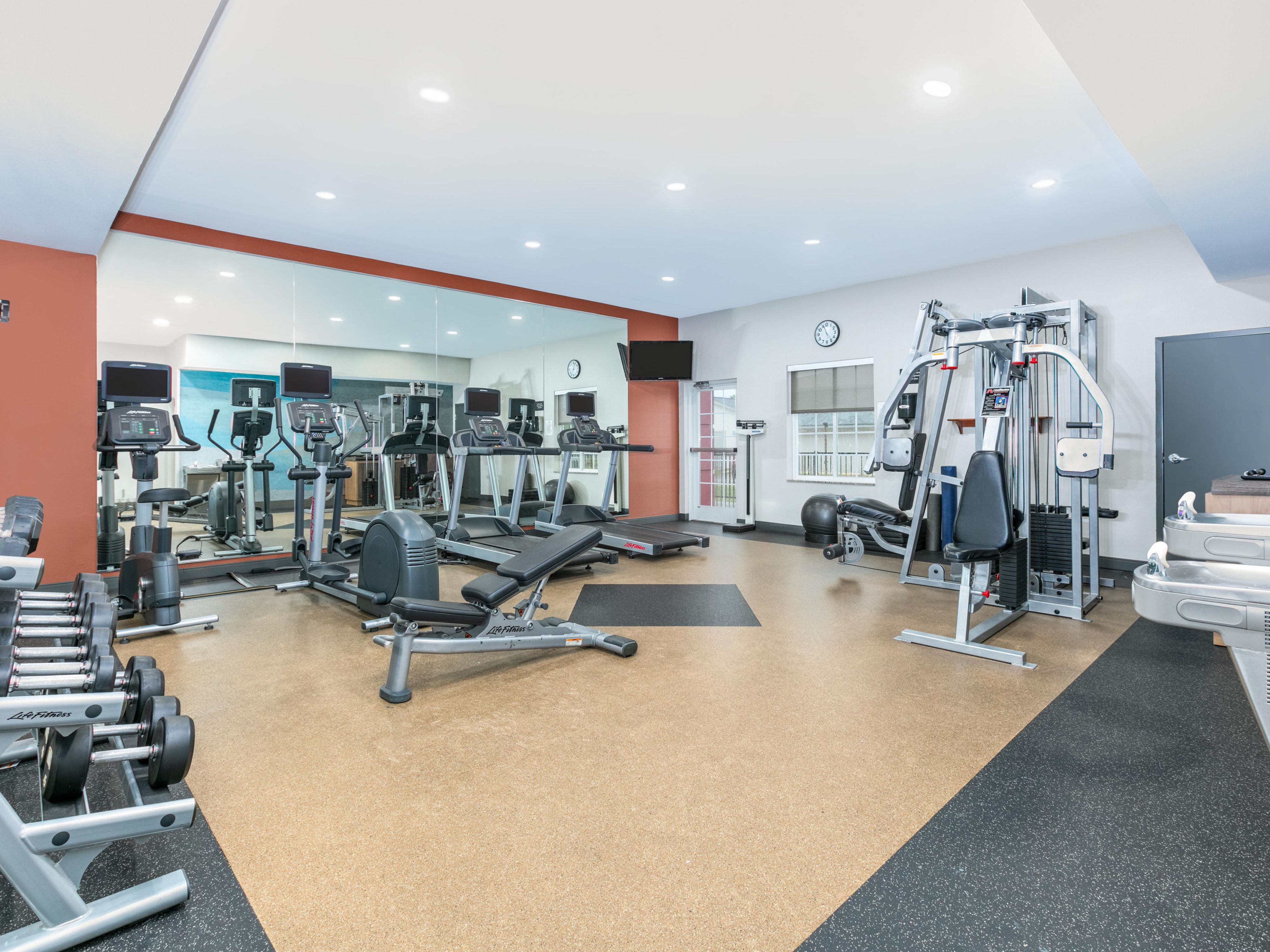 Keep up your routine in our 24-hour fitness center, equipped with cardio machines and free weights.