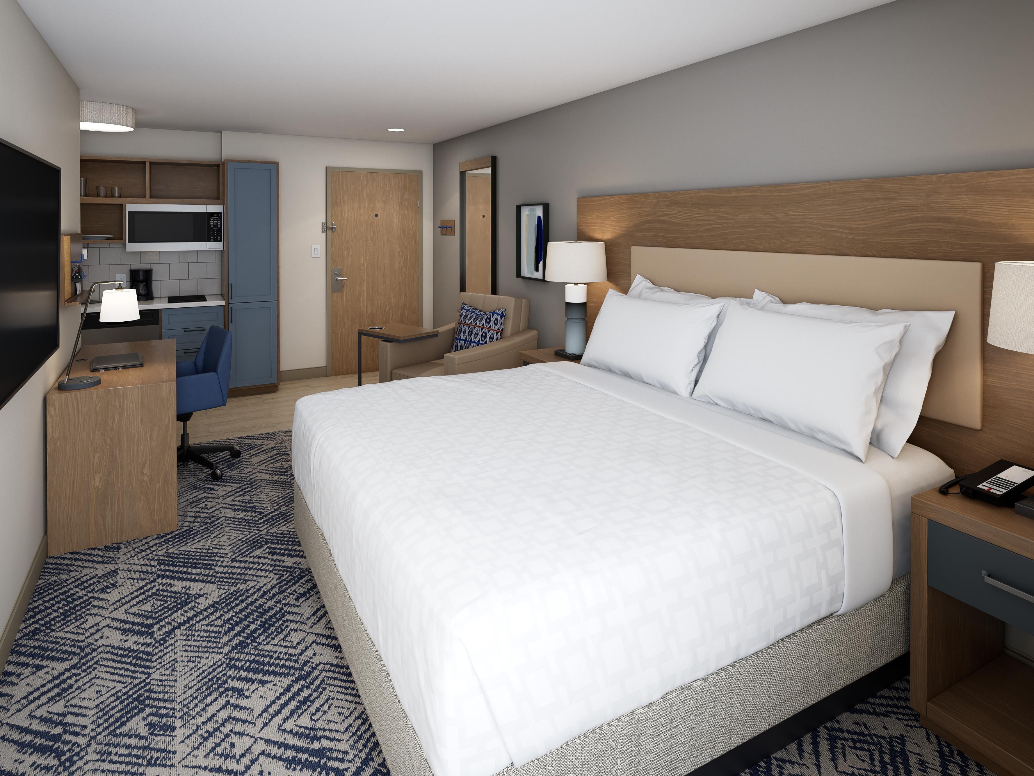 Unwind in our spacious king suite with a convenient full kitchen.