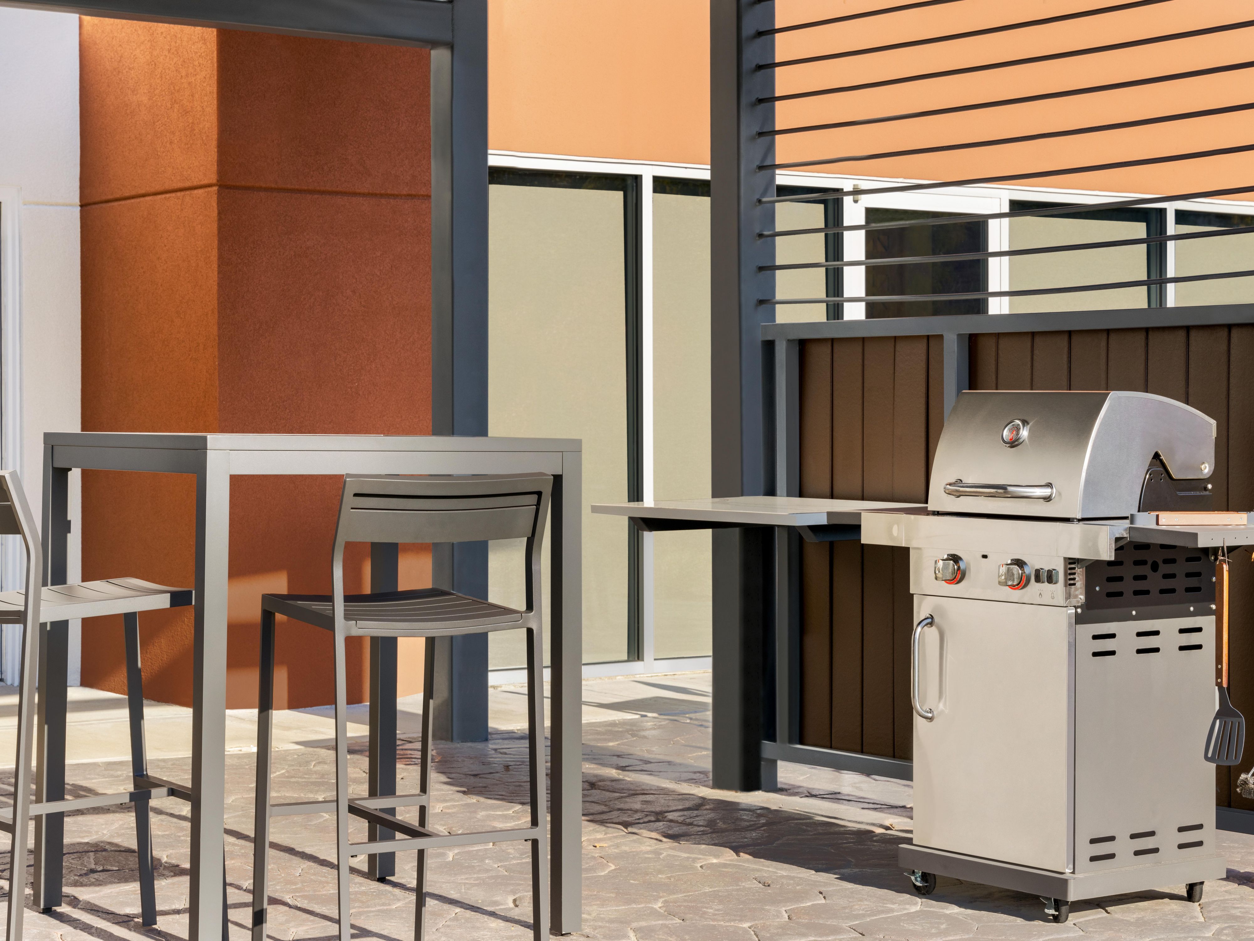 Enjoy our outdoor patio equipped with seating and a grill to cook up your favorite foods.  