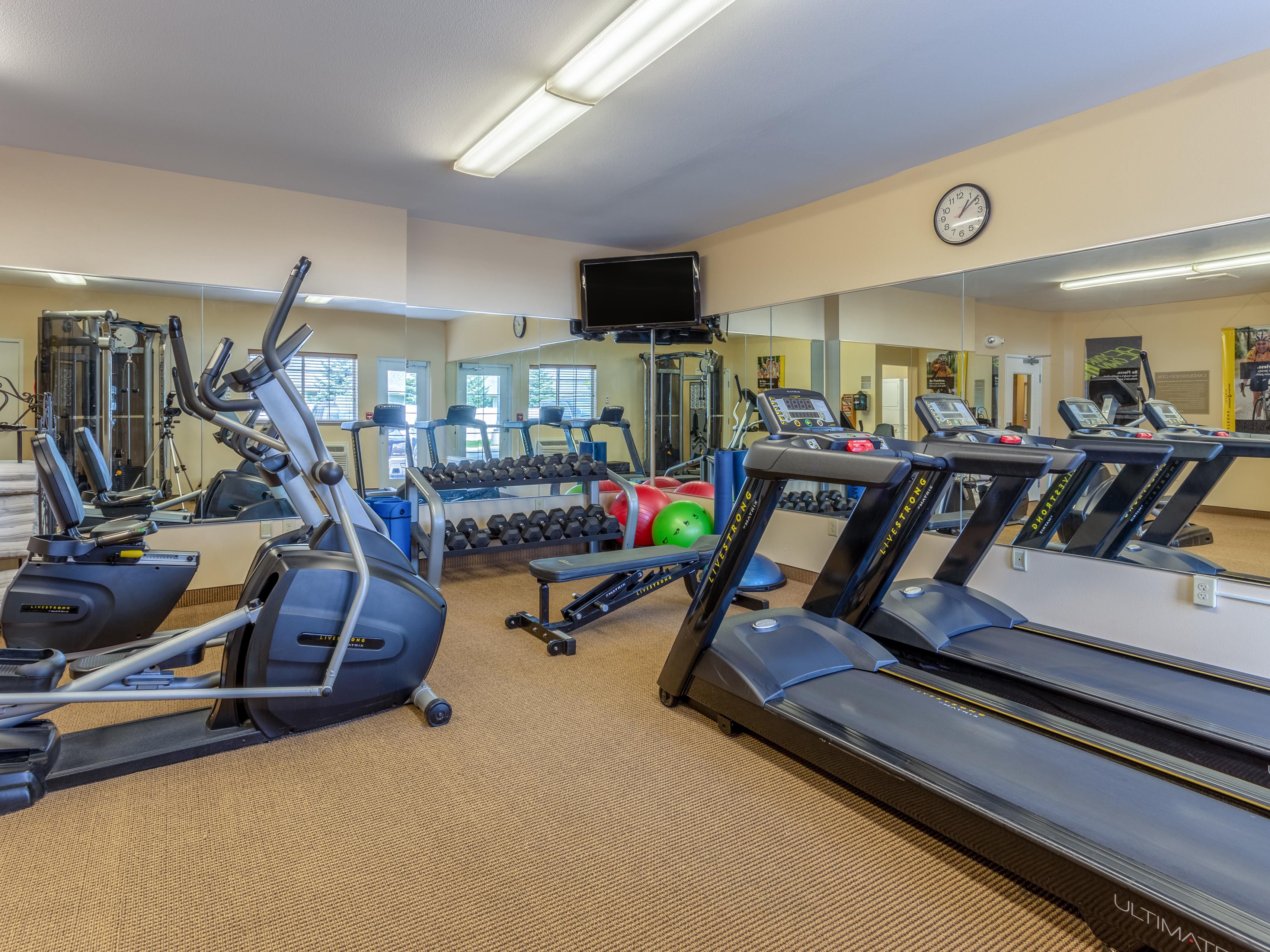 Work out Daily in Our 24-Hour Fitness Center