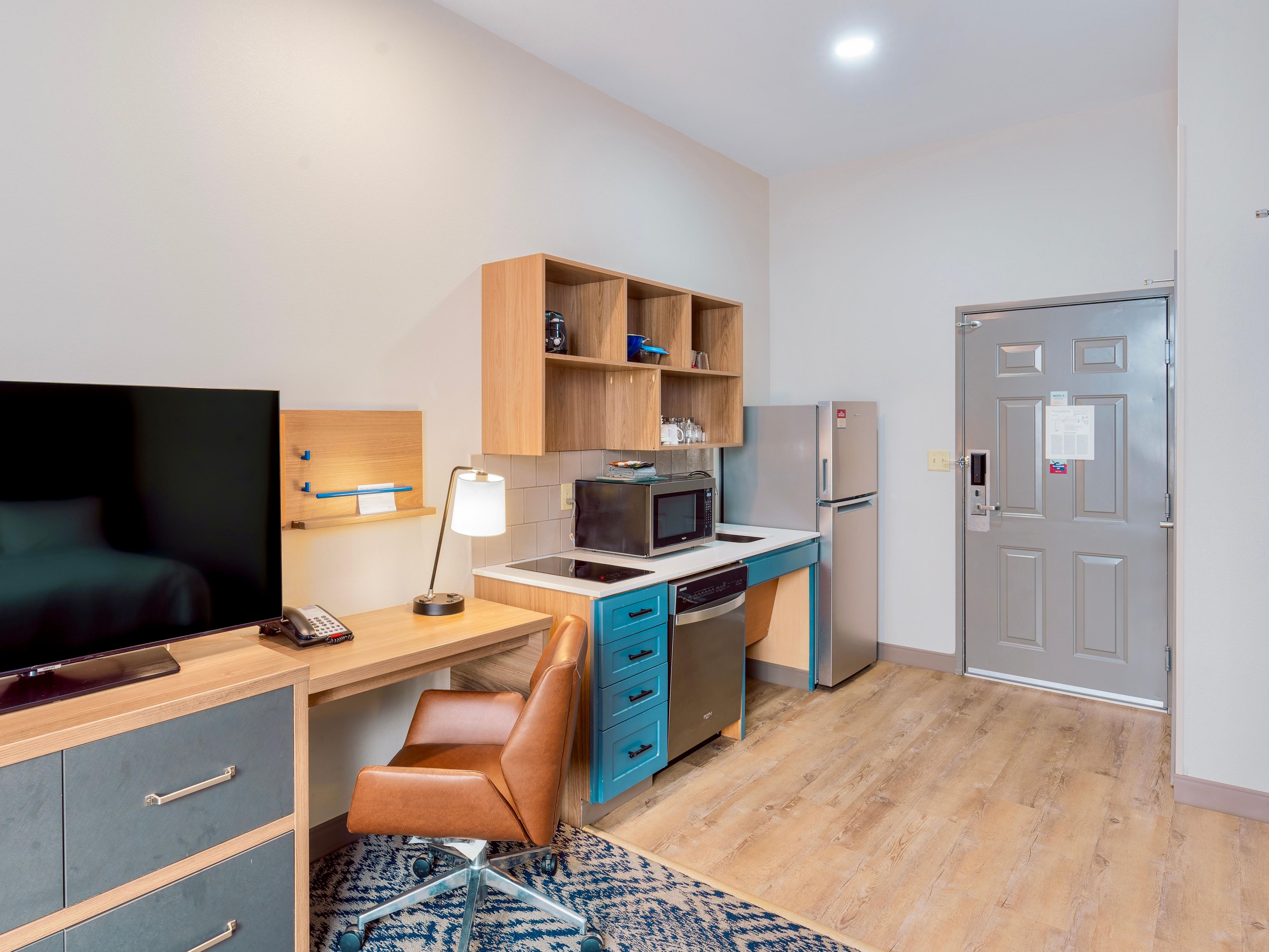 All rooms have a full size fridge, stovetop, dishwasher, microwave, toaster, and coffee maker. We also provide cookware, dishware, and flatware.