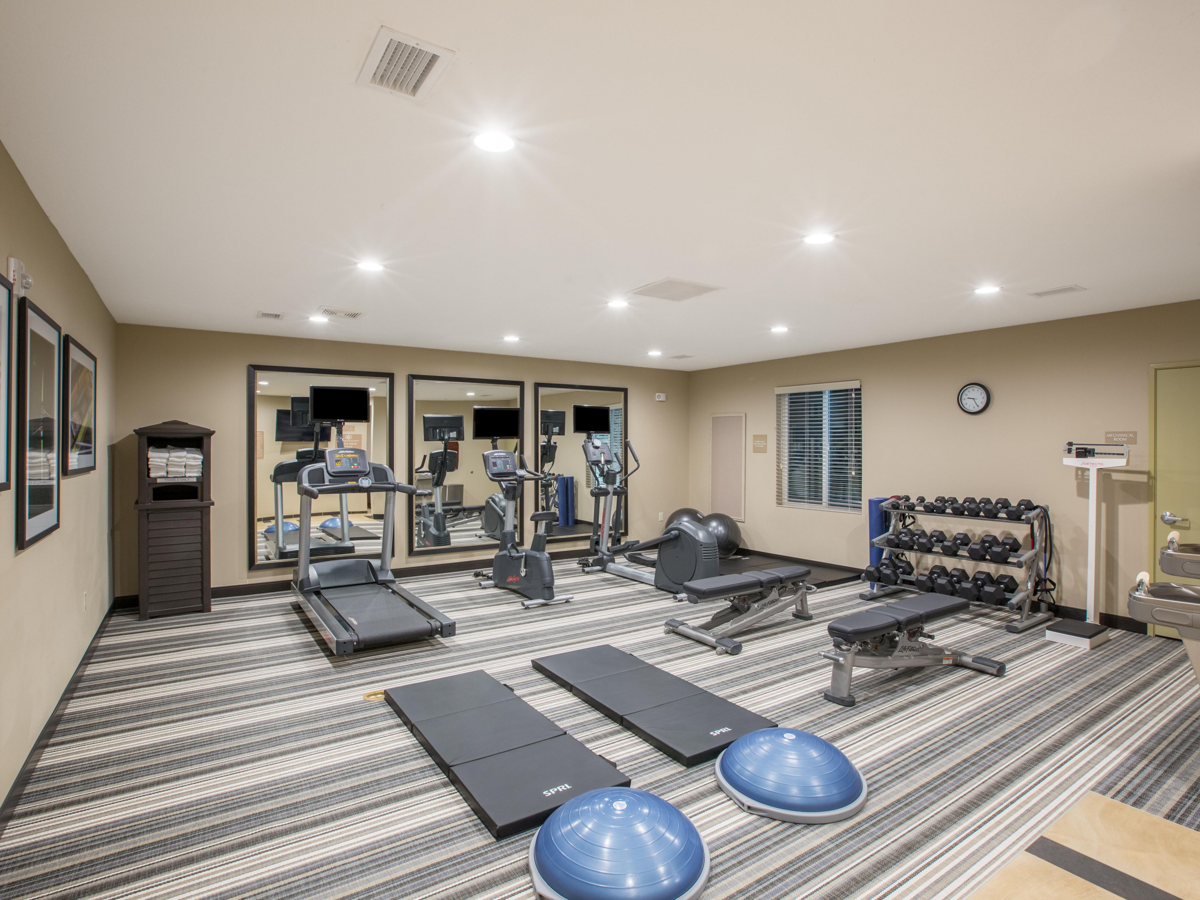 Stay on top of your fitness goals with our large fitness center!