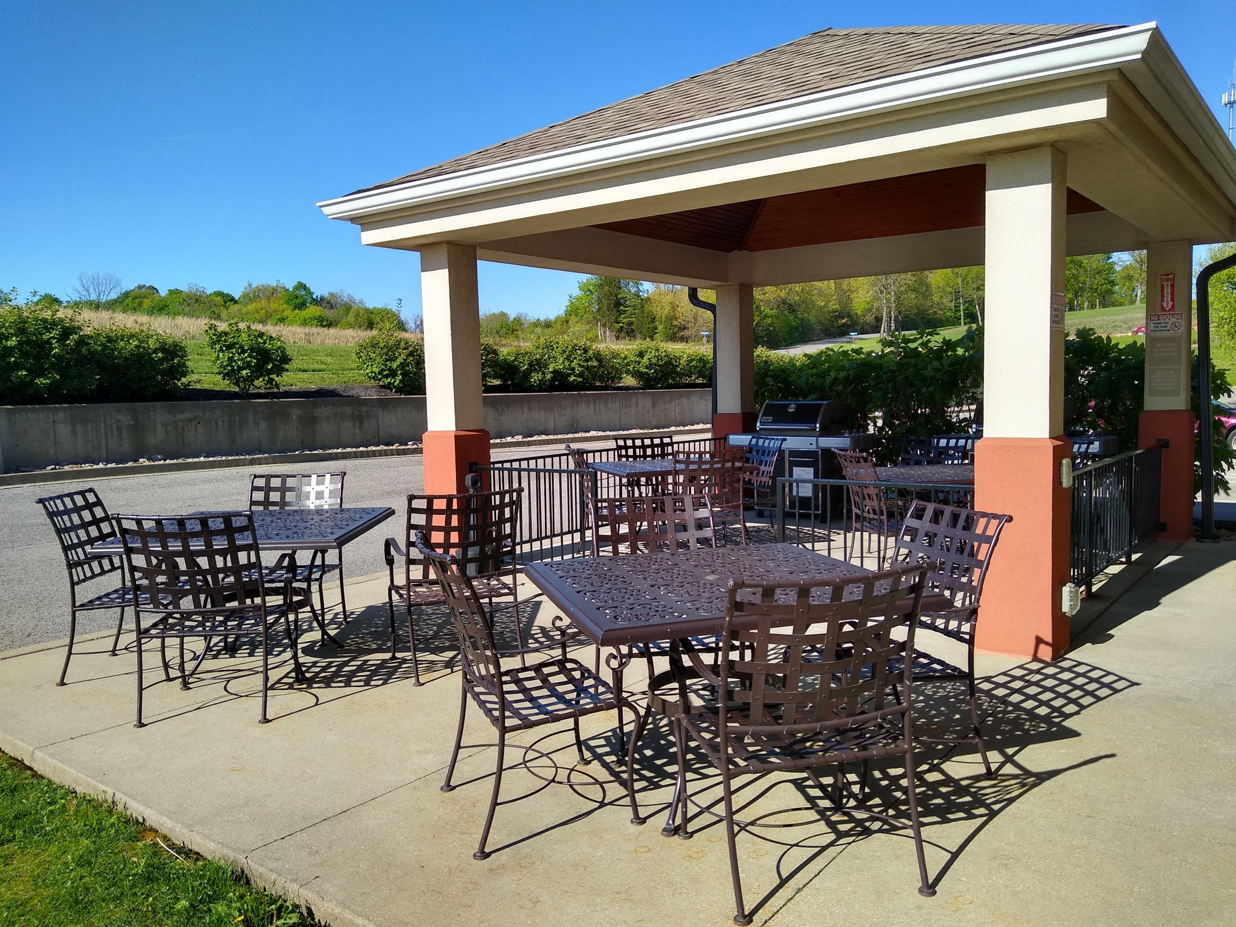 Enjoy our patio featuring seating and outdoor grill to cook up your favorite grilled yummy food.