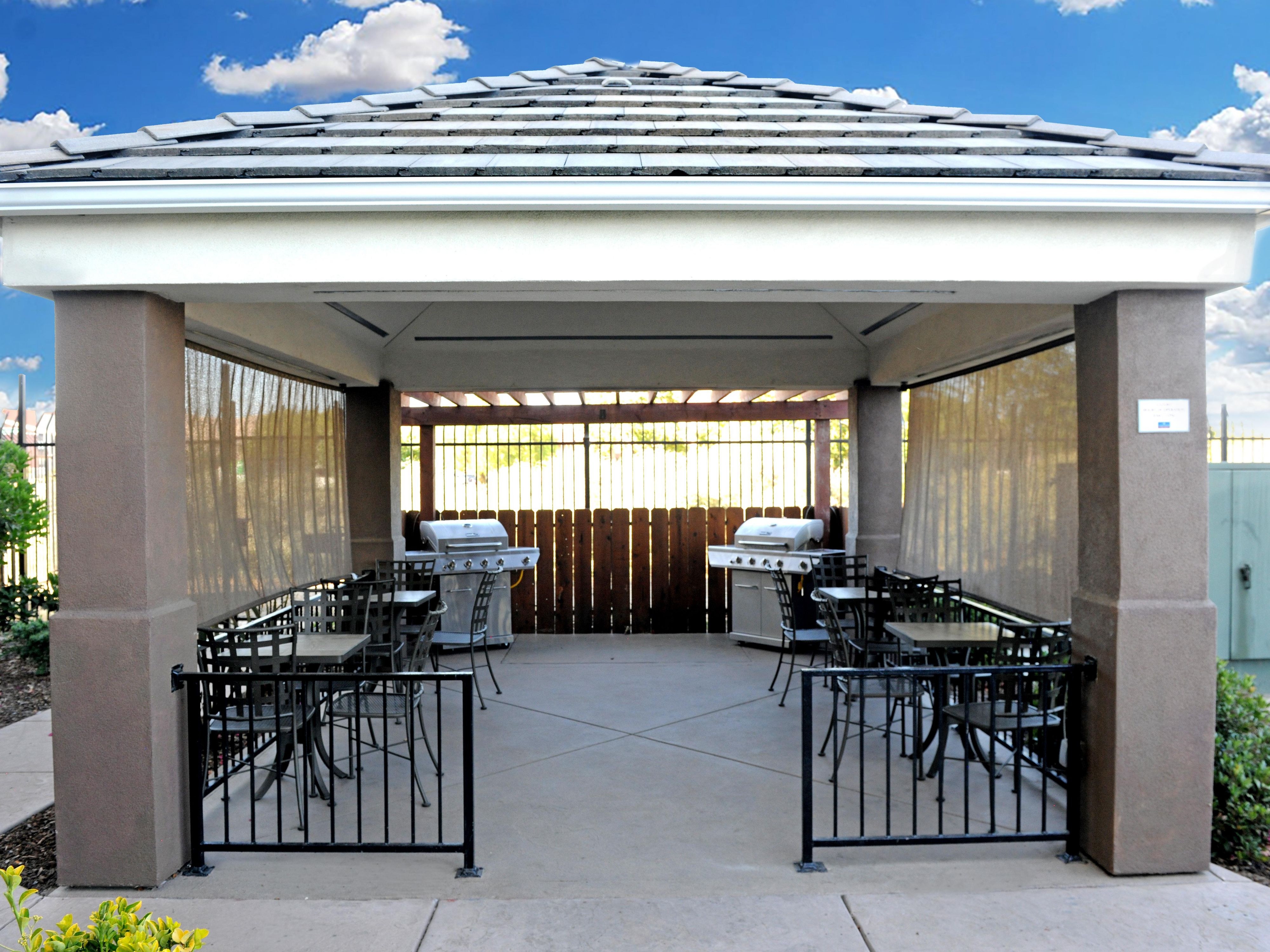 You might find a cozy corner on our gazebo patio for our guests to enjoy cooking and dining in our outdoor BBQ grill area. 